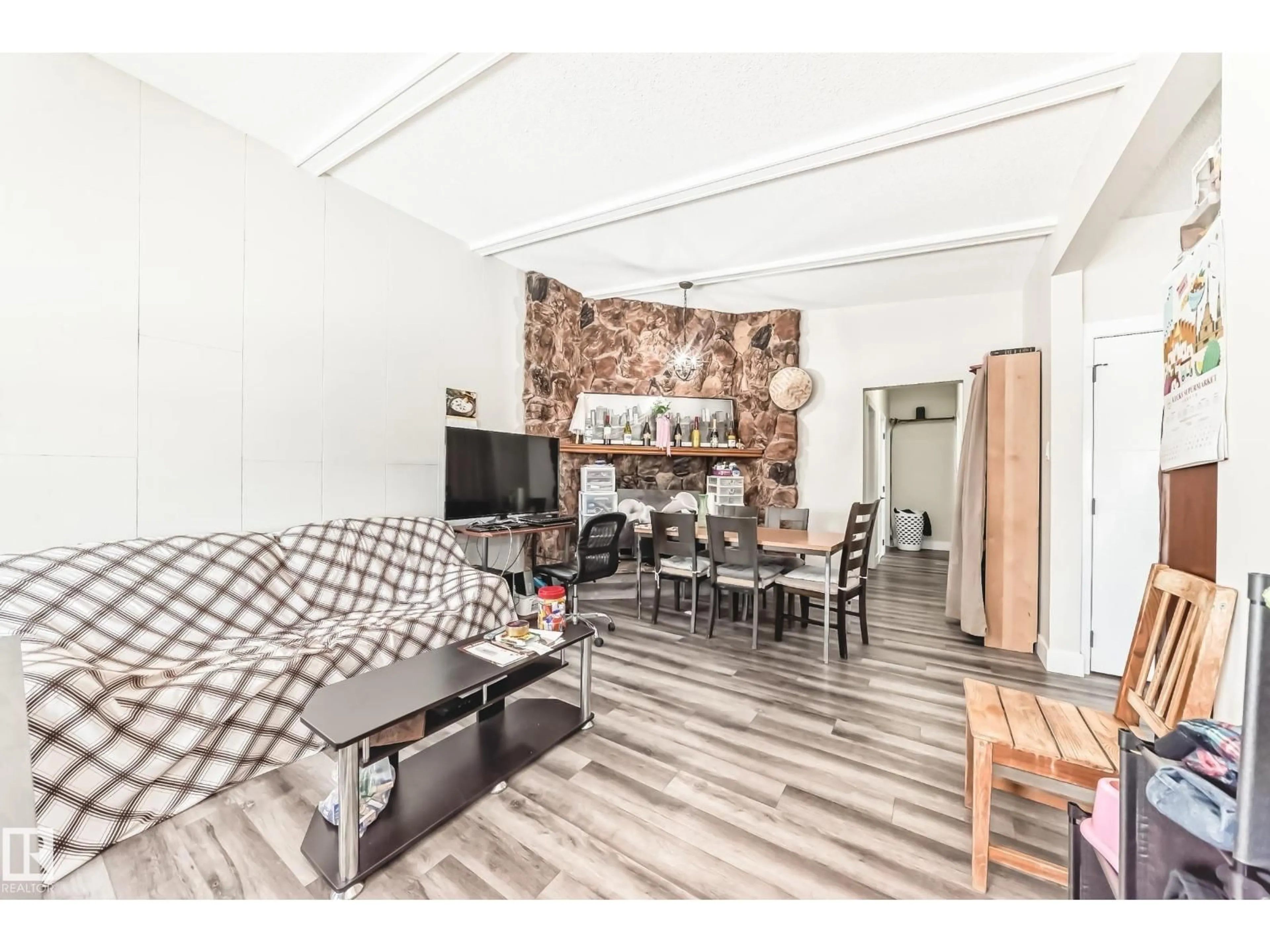 Living room with furniture, unknown for NW - 7604 7606 75 ST, Edmonton Alberta T6C2E9