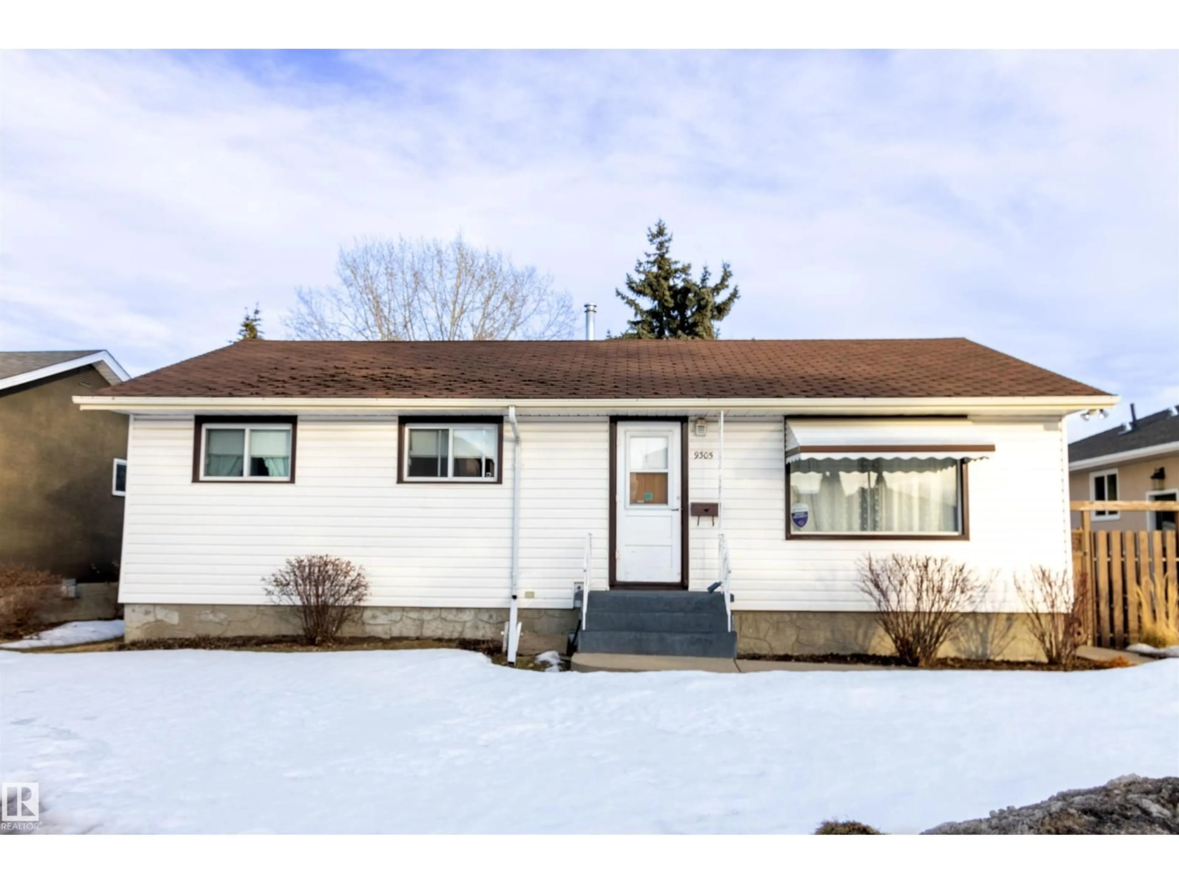 Home with vinyl exterior material, street for NW - 9305 151 ST, Edmonton Alberta T5R1K1