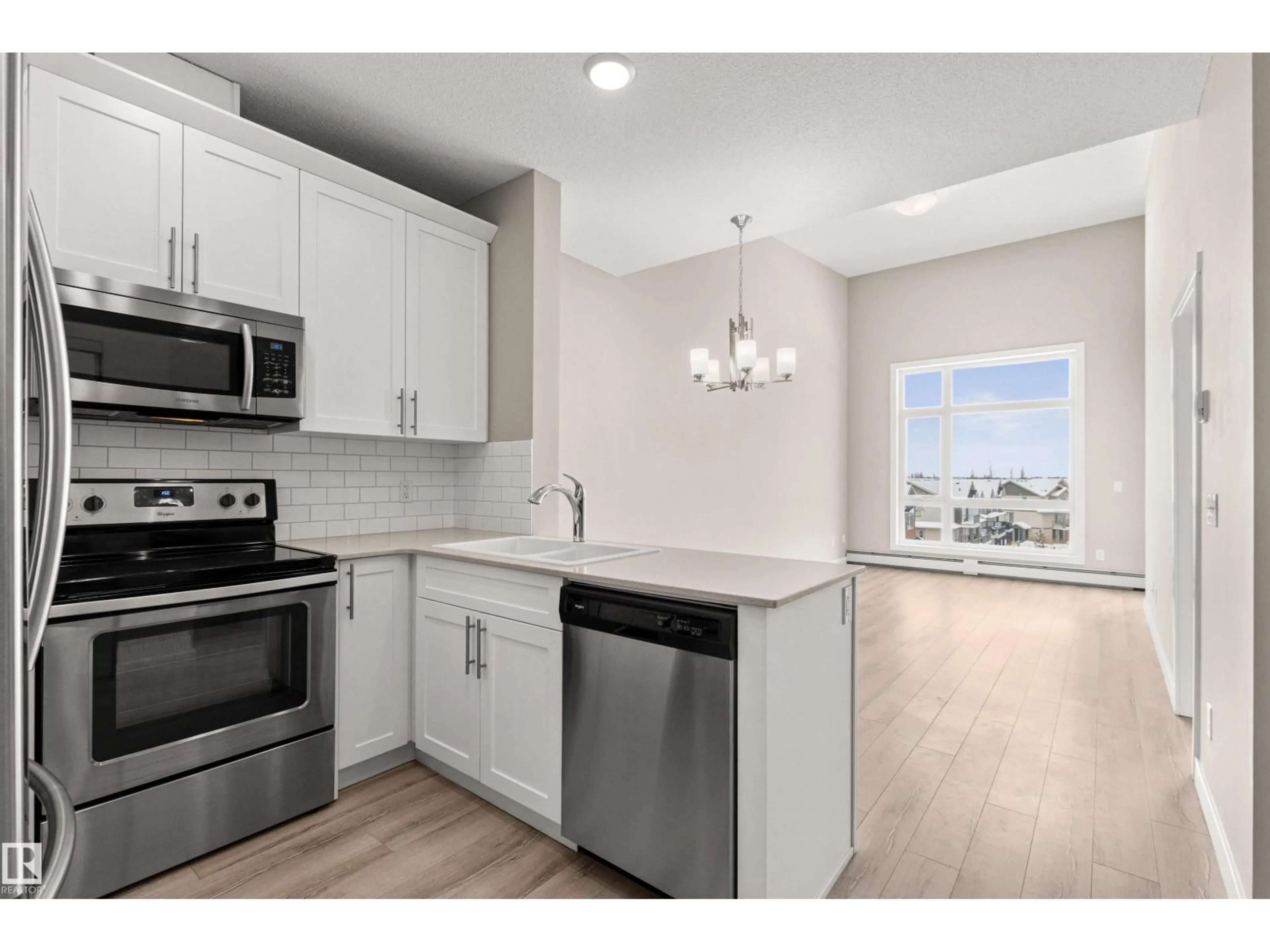 Open concept kitchen, unknown for #412 - 12804 140 AV, Edmonton Alberta T6V0M3