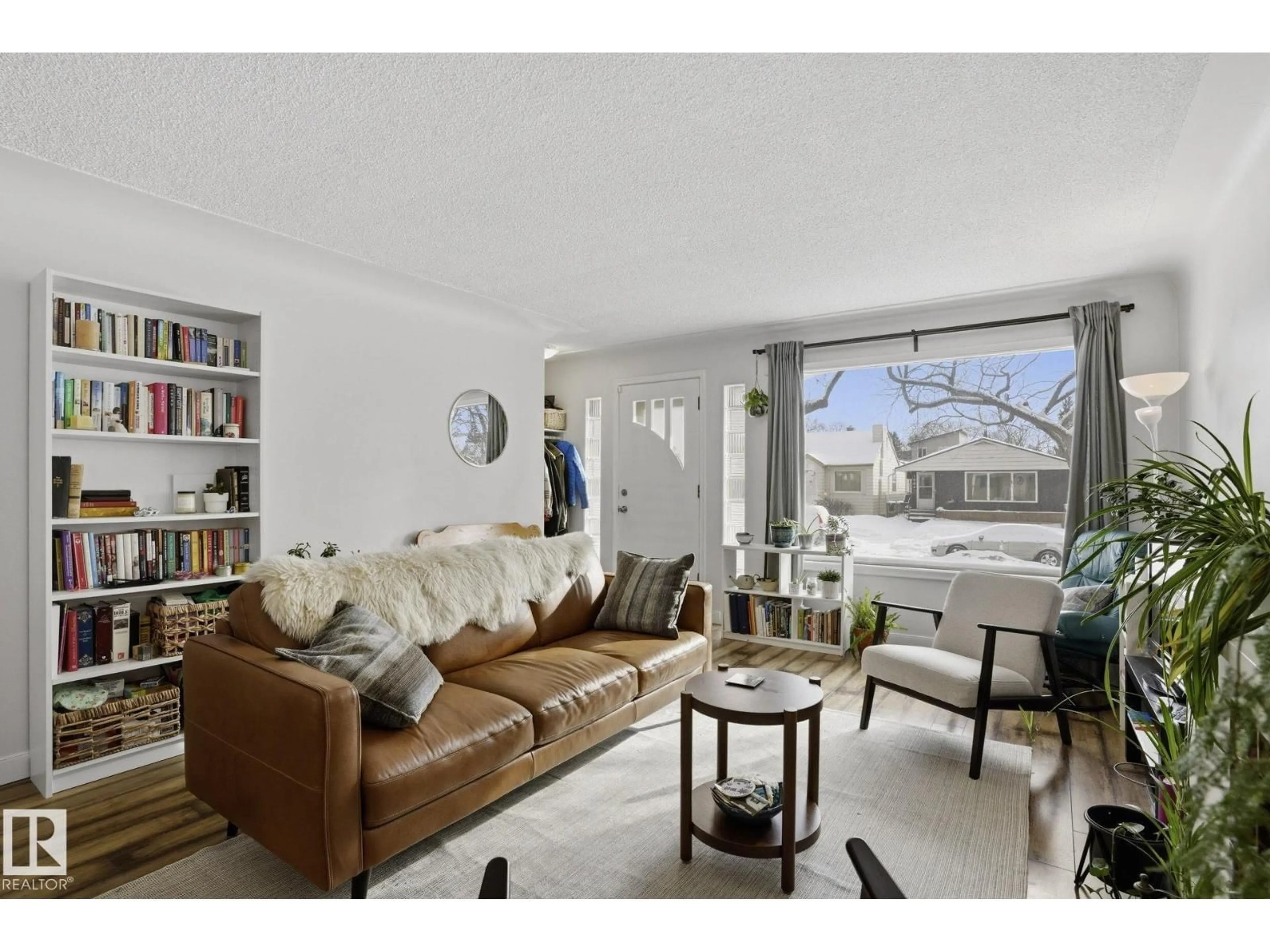 Living room with furniture, unknown for 10840 74 AV, Edmonton Alberta T6E1G9