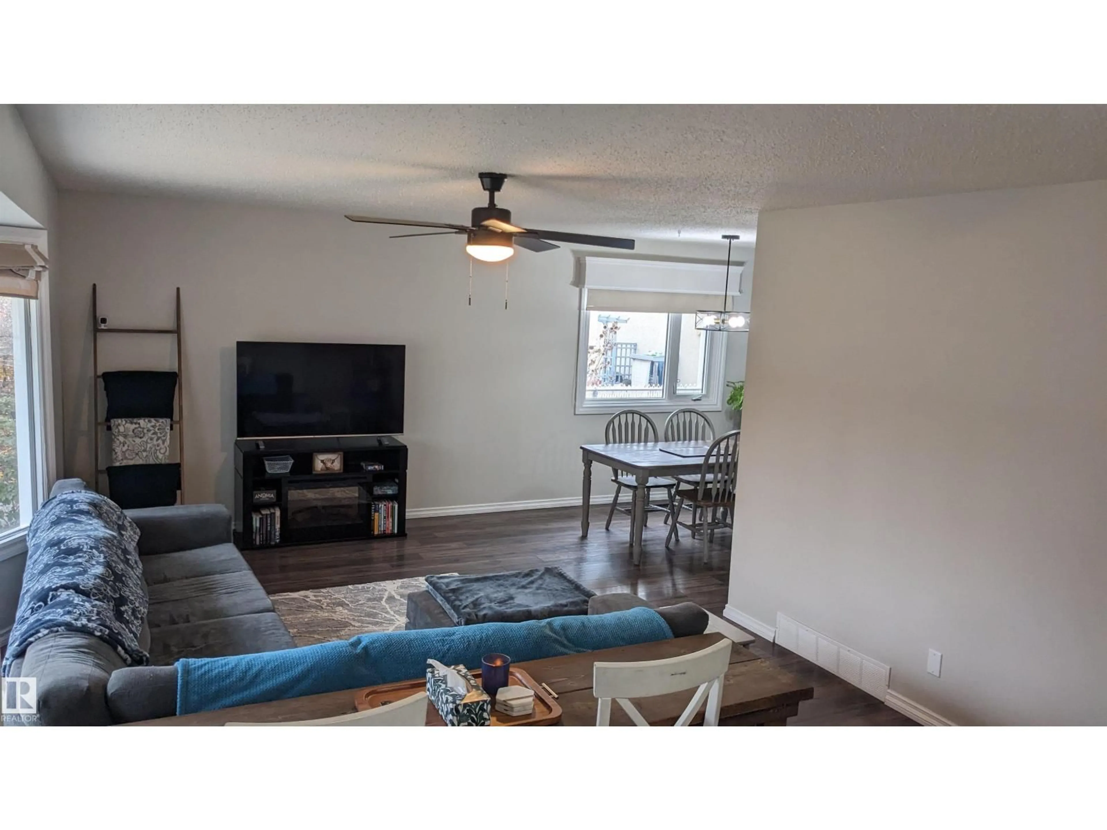 Living room with furniture, unknown for 6307 MARLER DR, Camrose Alberta T4V2Y6