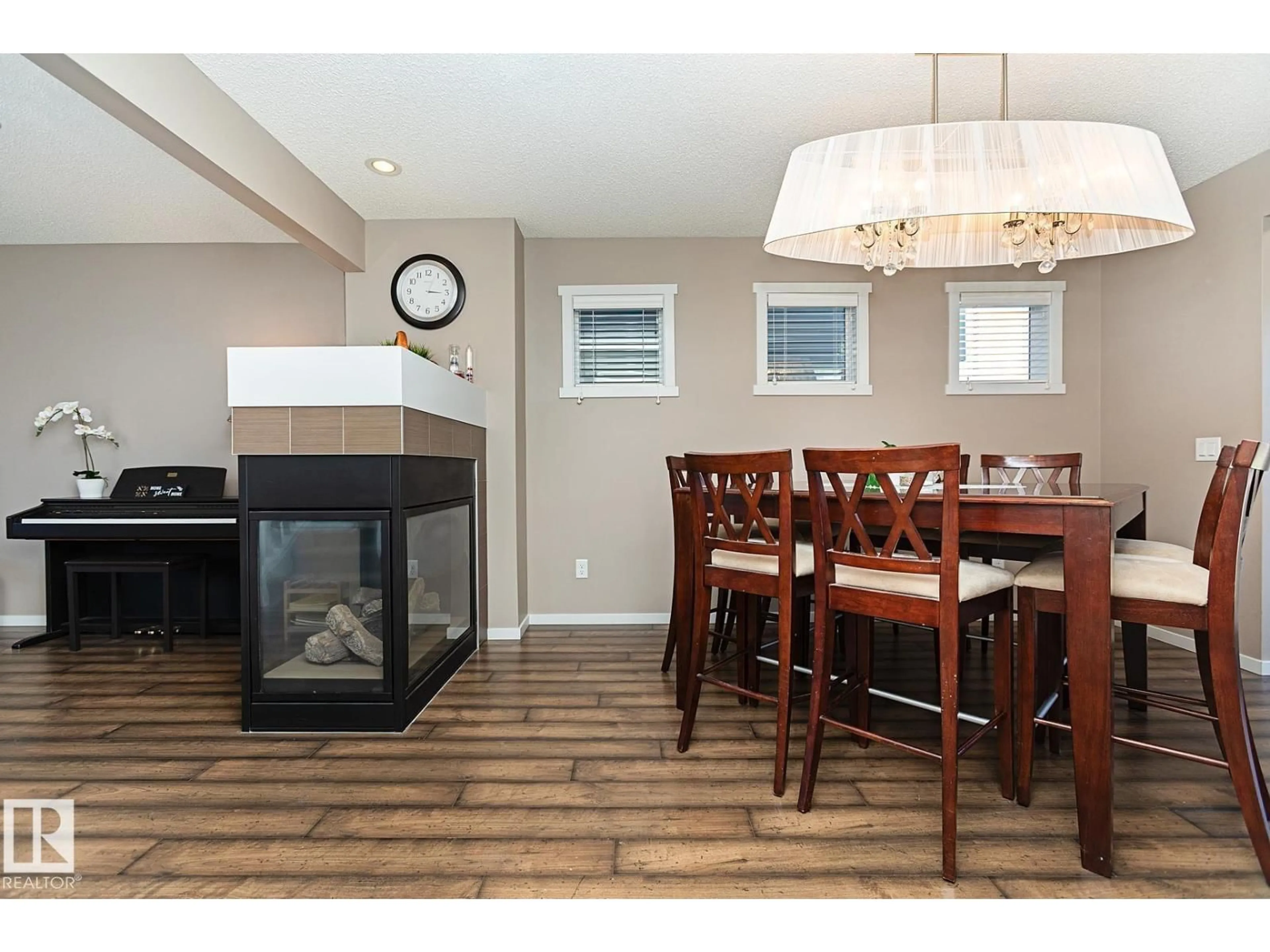 Open concept kitchen, wood/laminate floor for 1117 CHAPELLE BOULEVARD, Edmonton Alberta T6W0Y9