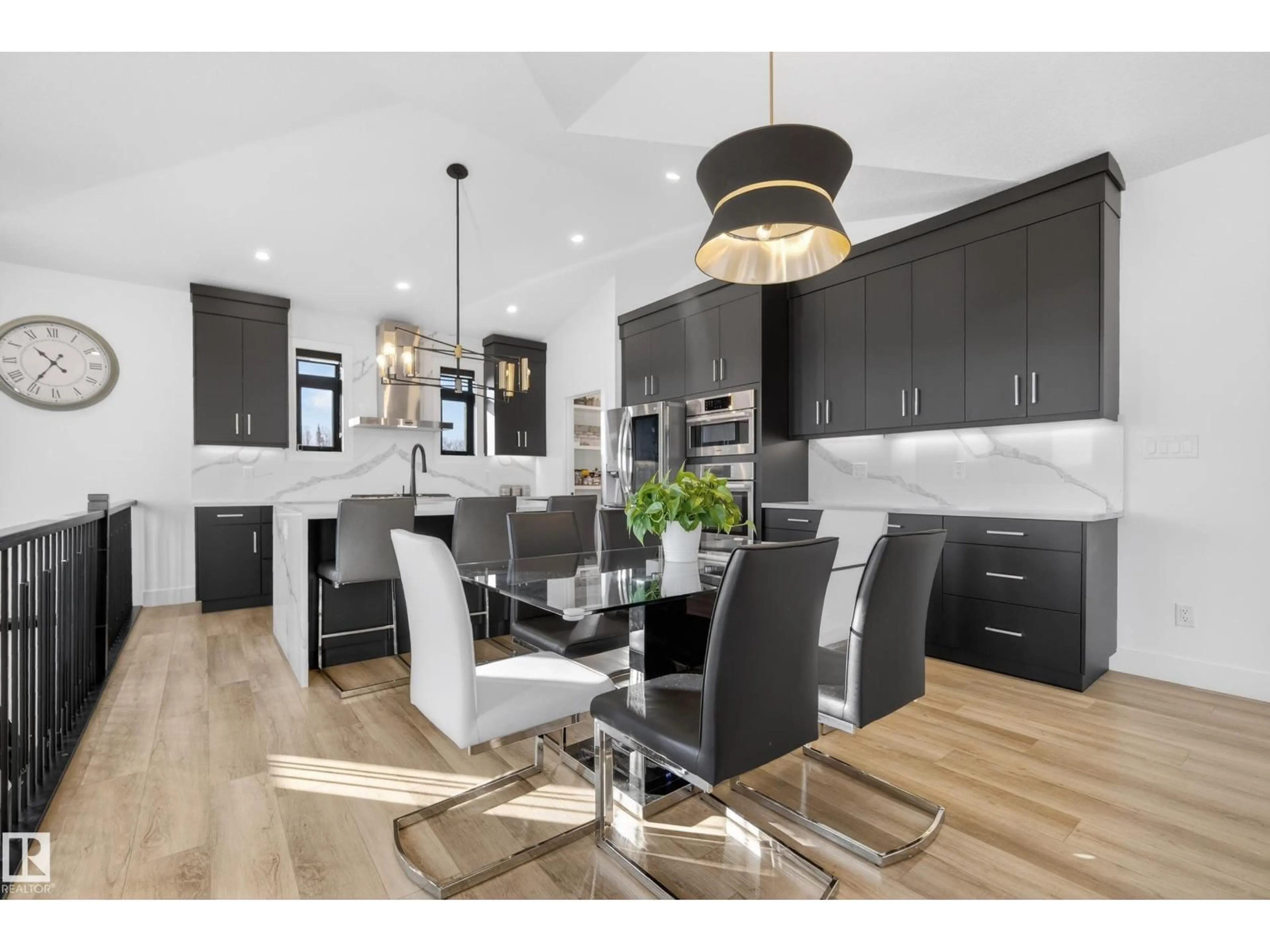 Open concept kitchen, wood/laminate floor for 52 25527 TWP ROAD 511 A, Rural Parkland County Alberta T7Y1A8