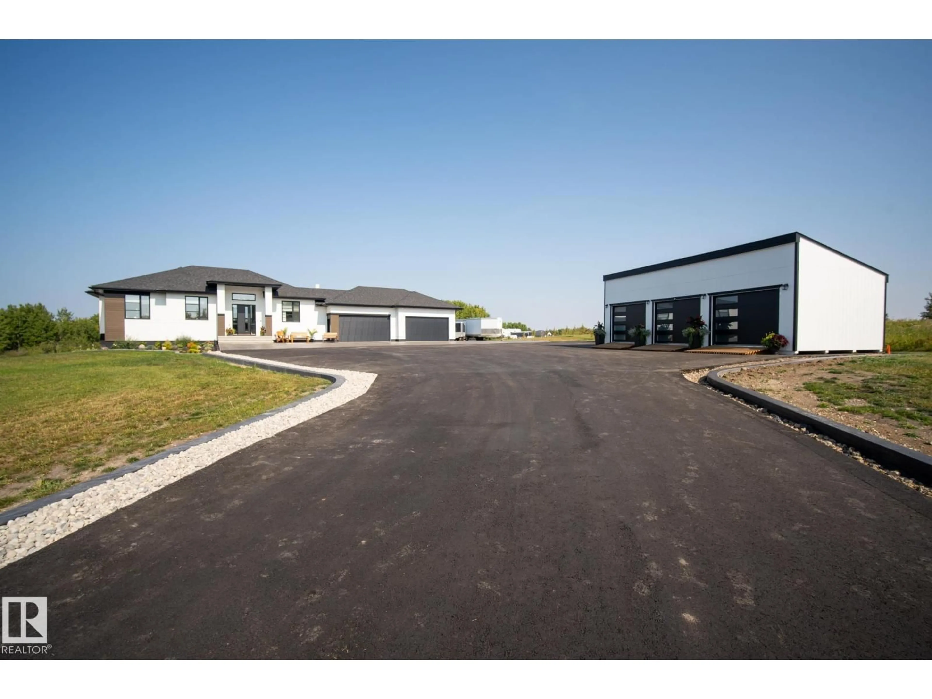 A pic from outside/outdoor area/front of a property/back of a property/a pic from drone, building for 265 20212 TWP ROAD ROAD, Rural Strathcona County Alberta T8G1E4
