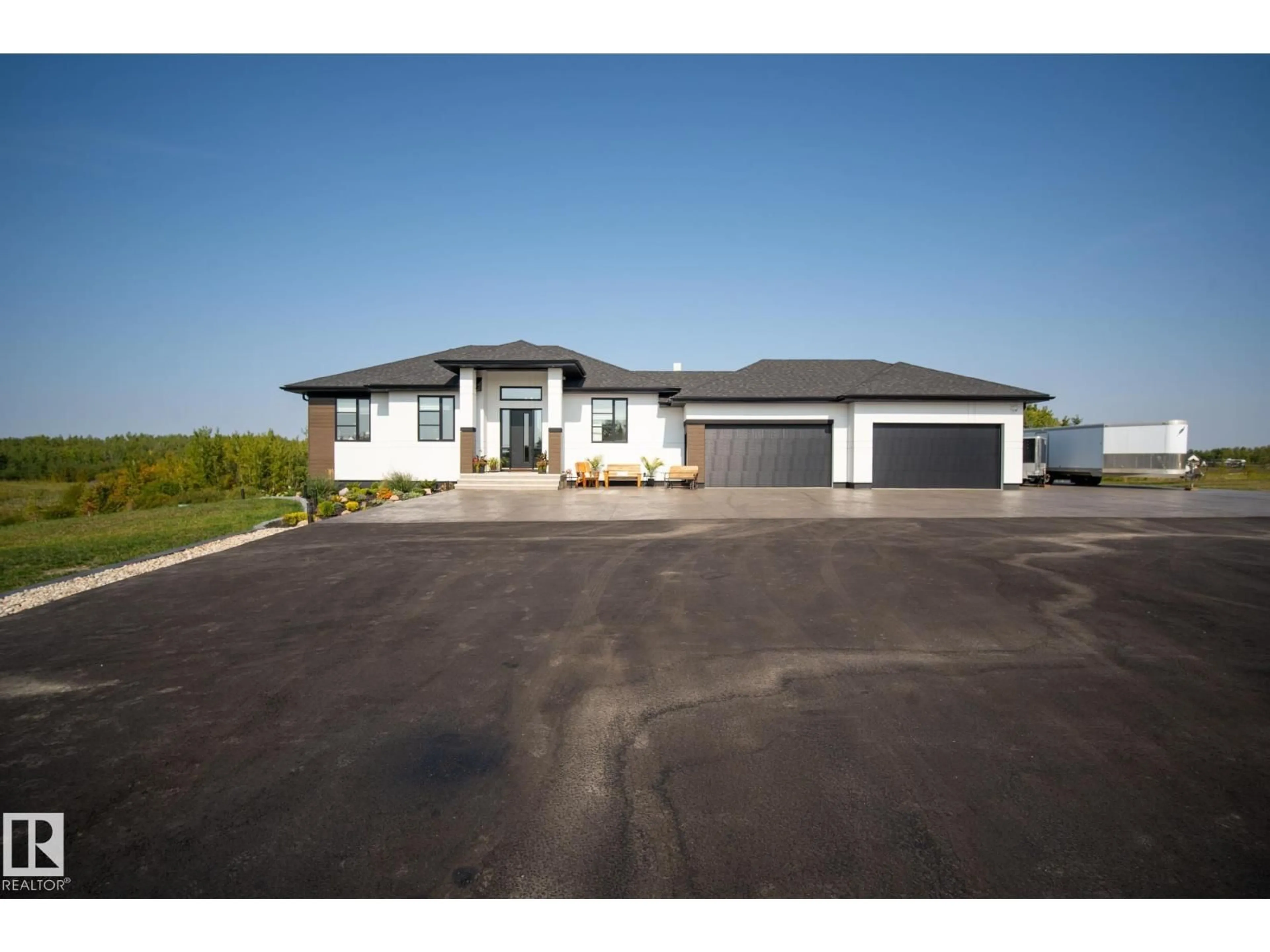 A pic from outside/outdoor area/front of a property/back of a property/a pic from drone, street for 265 20212 TWP ROAD ROAD, Rural Strathcona County Alberta T8G1E4