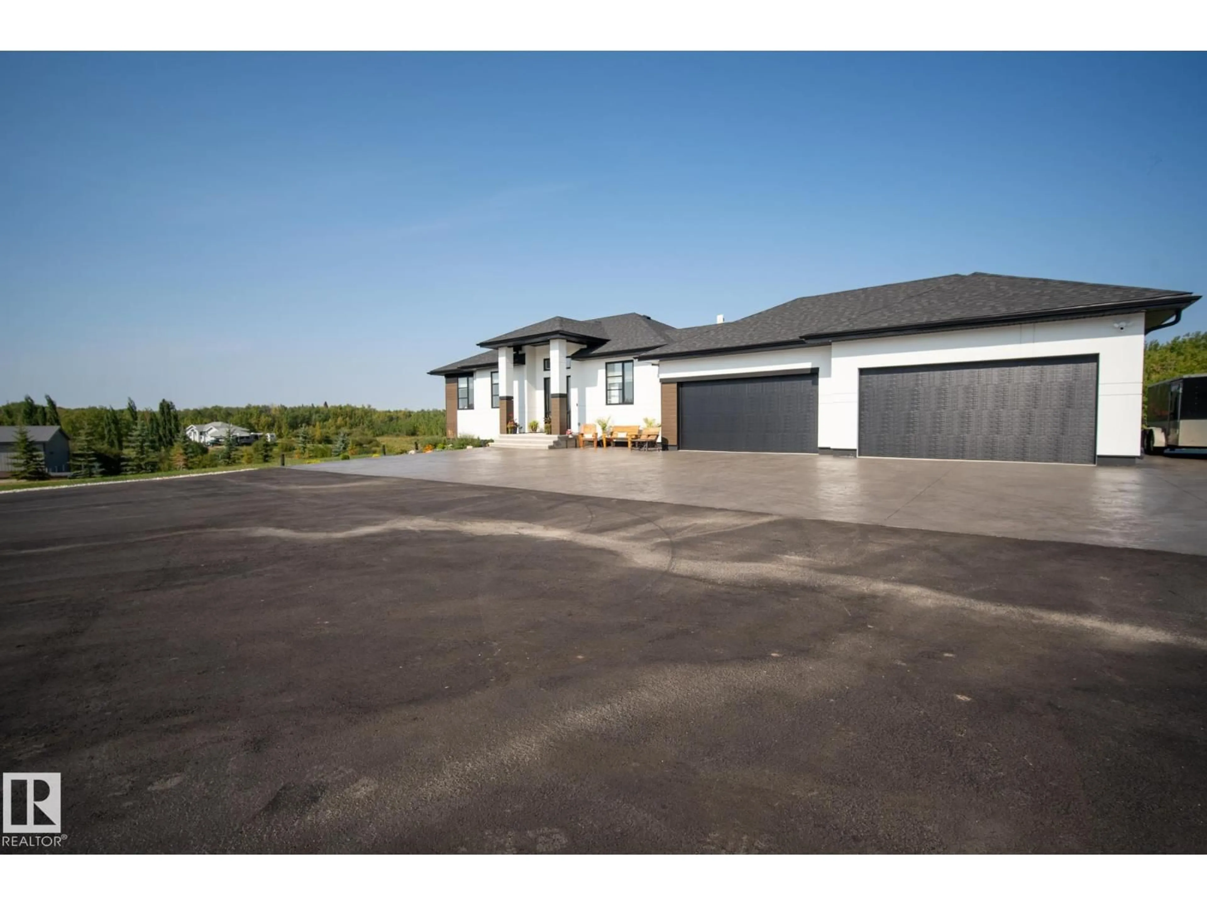 A pic from outside/outdoor area/front of a property/back of a property/a pic from drone, street for 265 20212 TWP ROAD ROAD, Rural Strathcona County Alberta T8G1E4