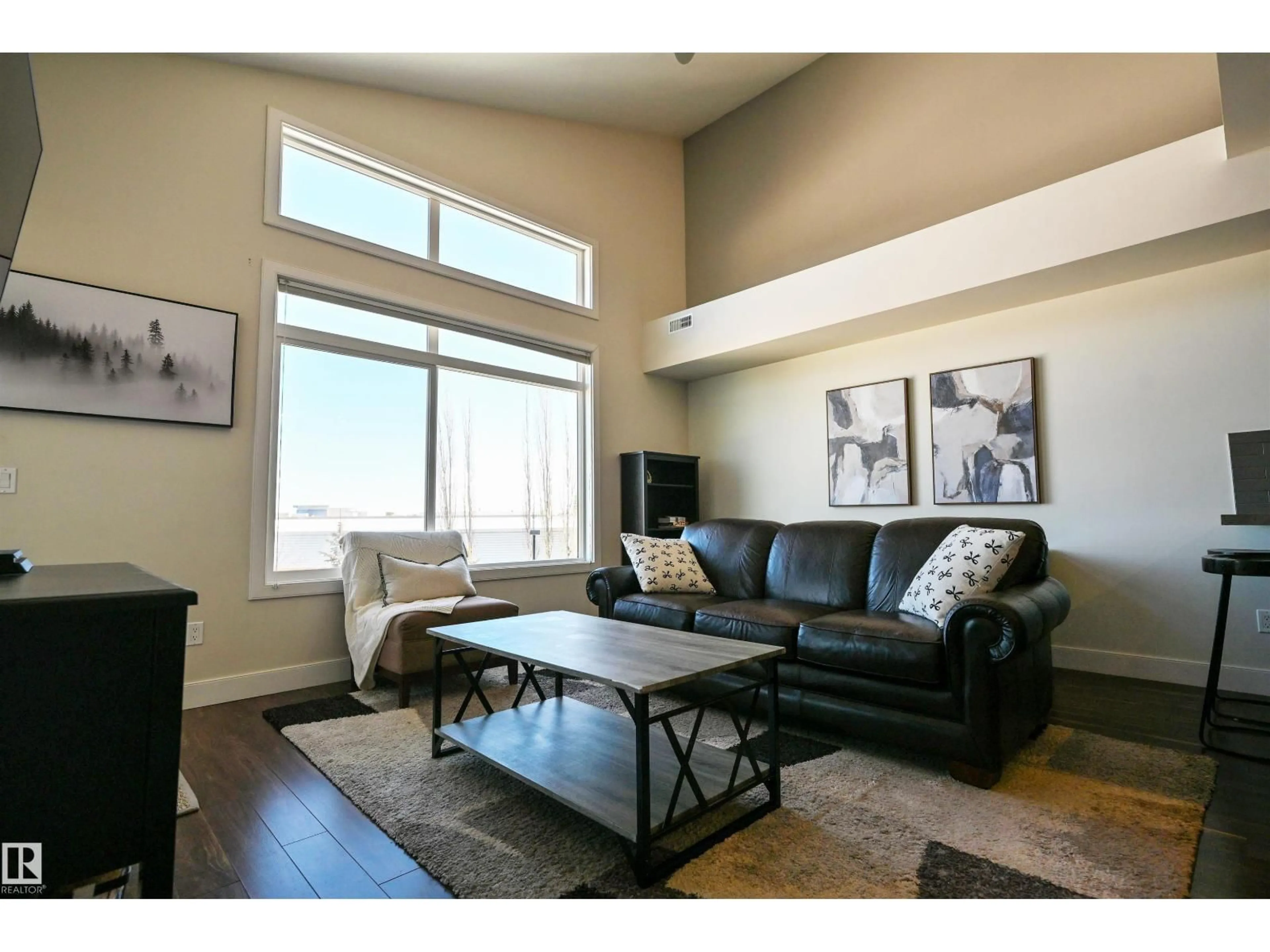 Living room with furniture, wood/laminate floor for 302 - 279 WYE RD, Sherwood Park Alberta T8B0A7