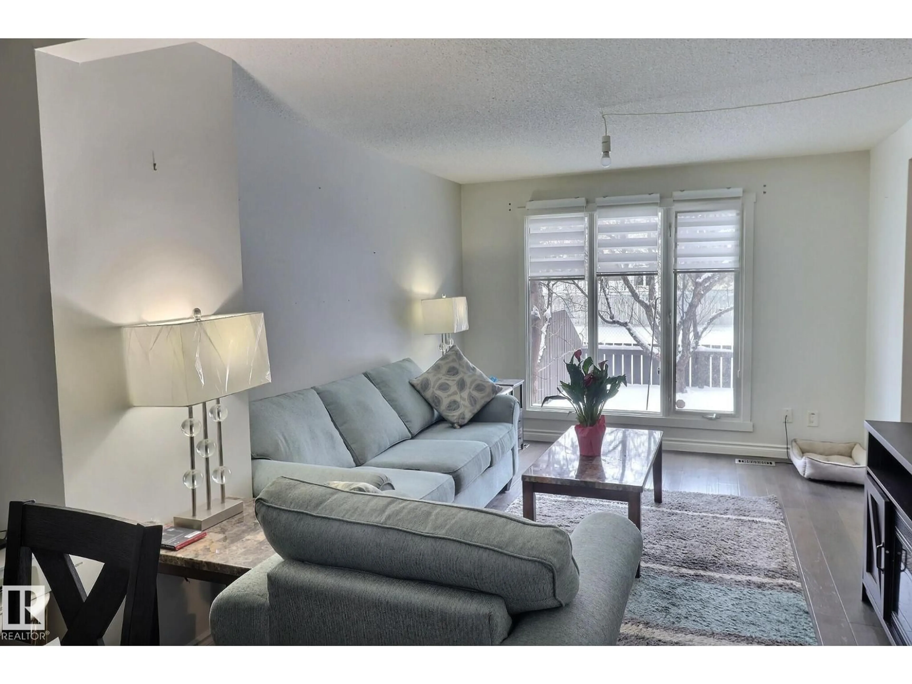 Living room with furniture, unknown for 18285 84 AV, Edmonton Alberta T5T1T7