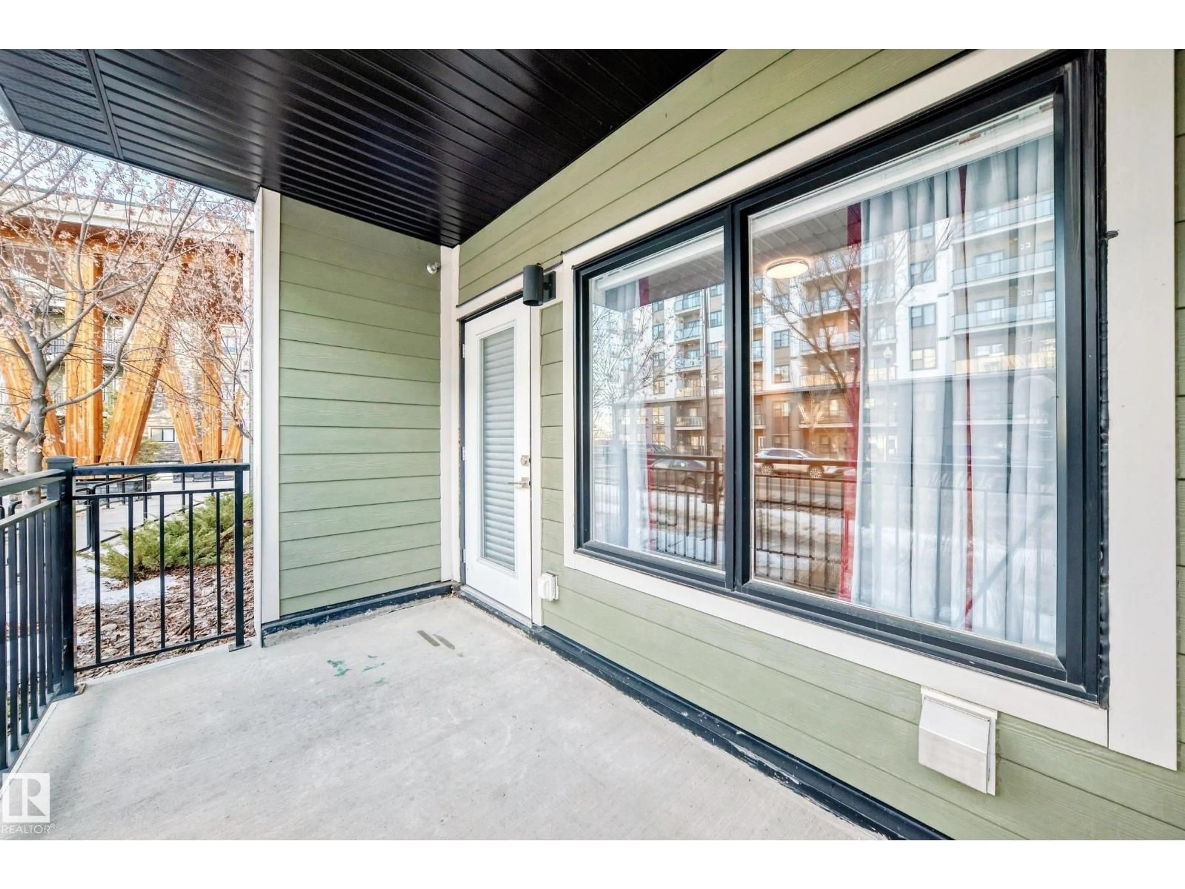 Patio, street for 560 - 124 GRIESBACH PARADE, Edmonton Alberta T5E6X1