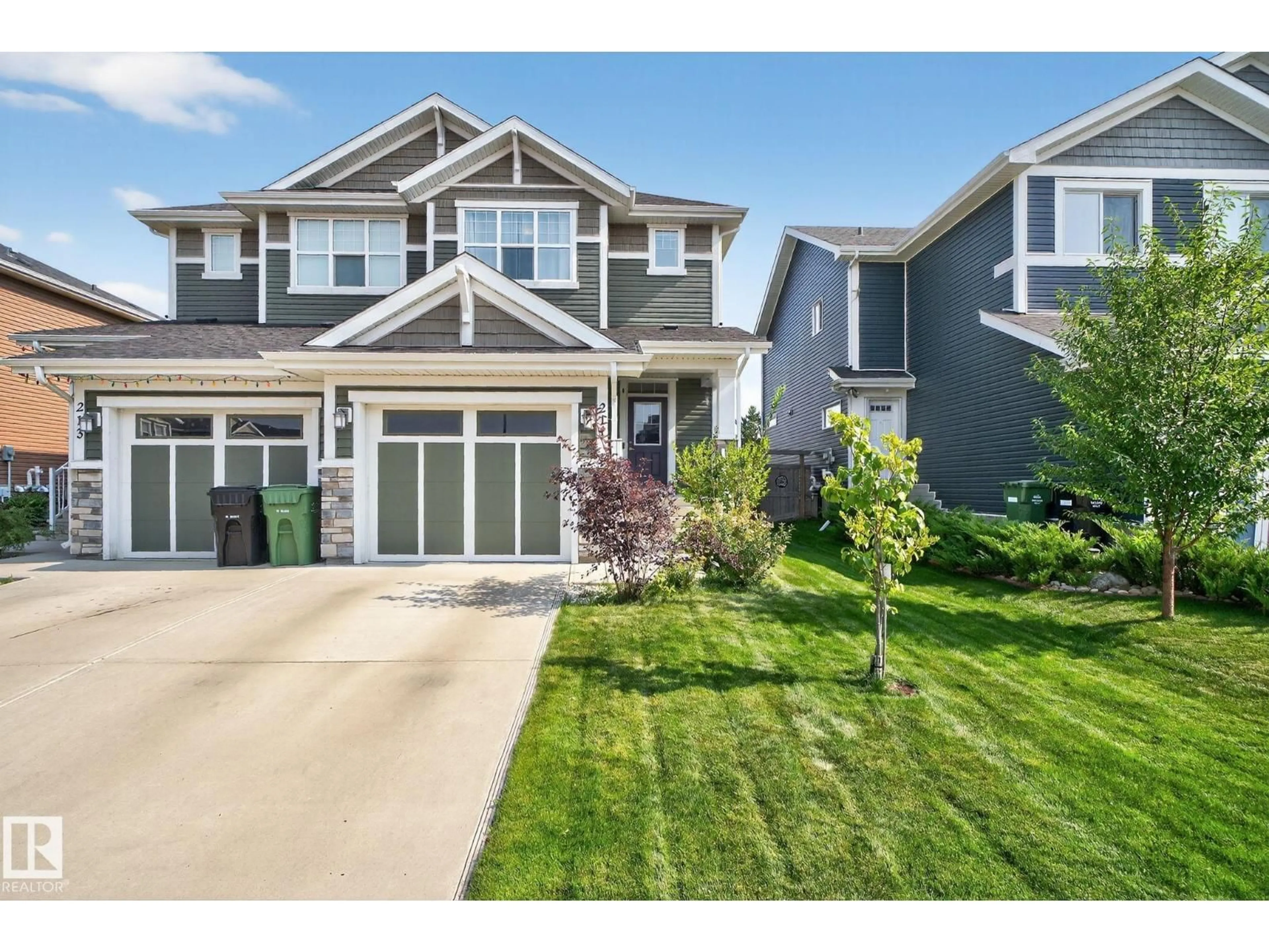 Home with vinyl exterior material, street for 211 STURTZ BN, Leduc Alberta T9E0Y6