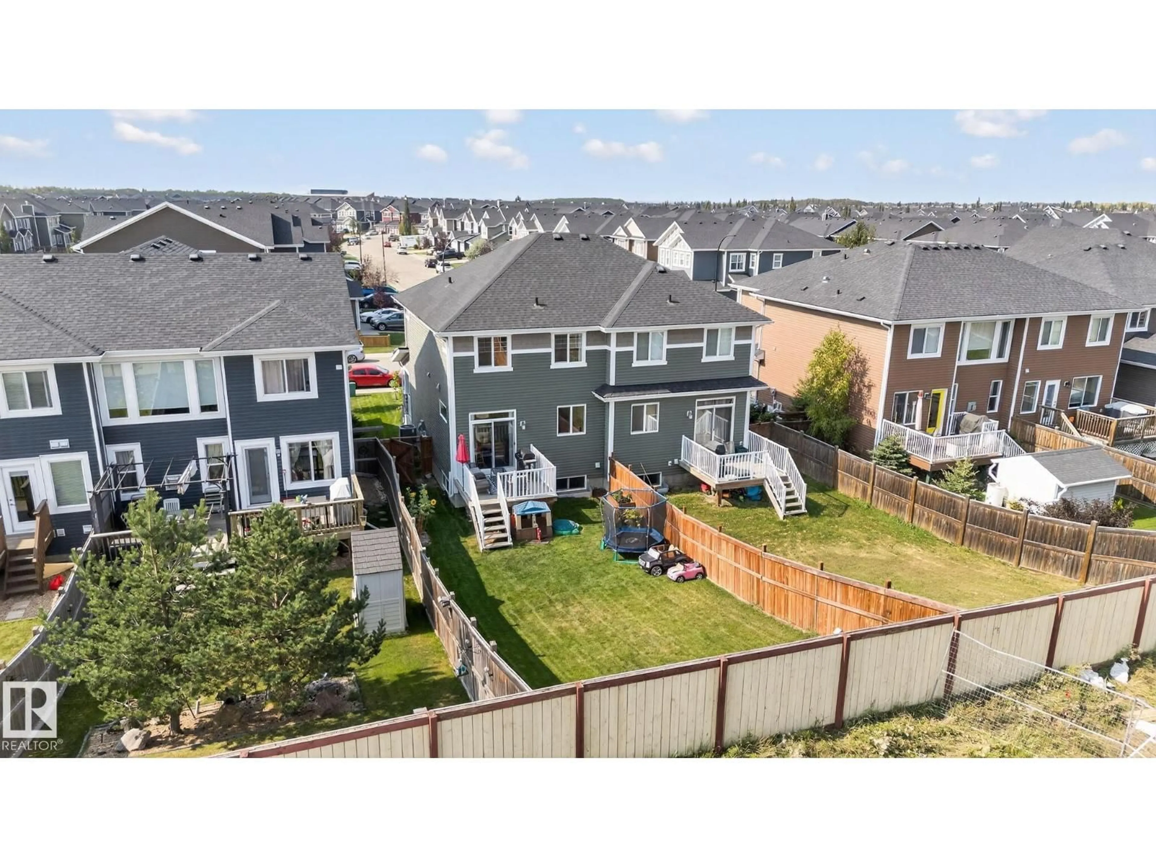 A pic from outside/outdoor area/front of a property/back of a property/a pic from drone, mountain view for 211 STURTZ BN, Leduc Alberta T9E0Y6