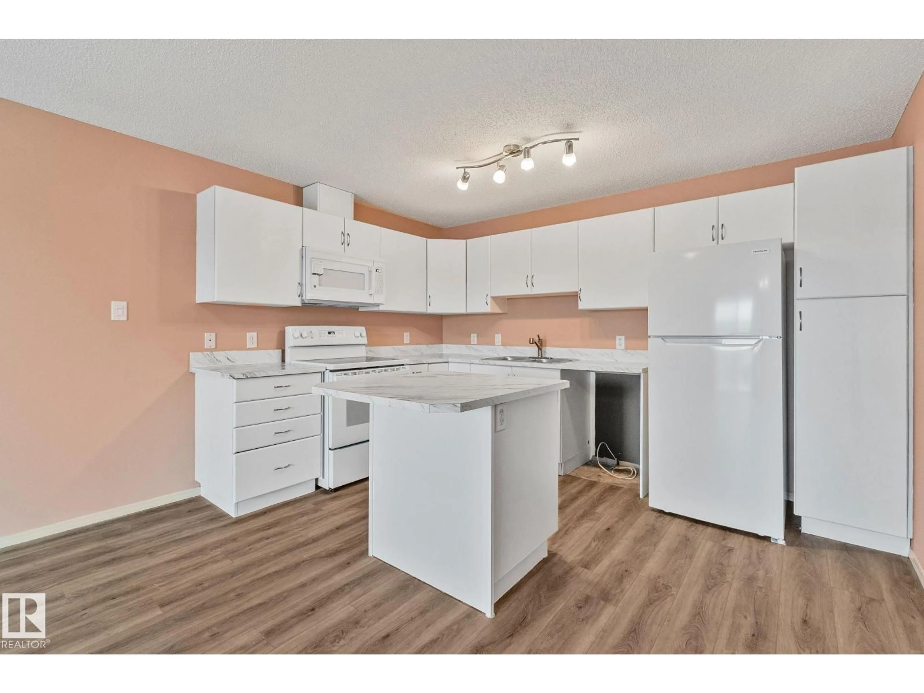 Standard kitchen, wood/laminate floor for #406 - 16035 132 ST NW, Edmonton Alberta T6V0B4
