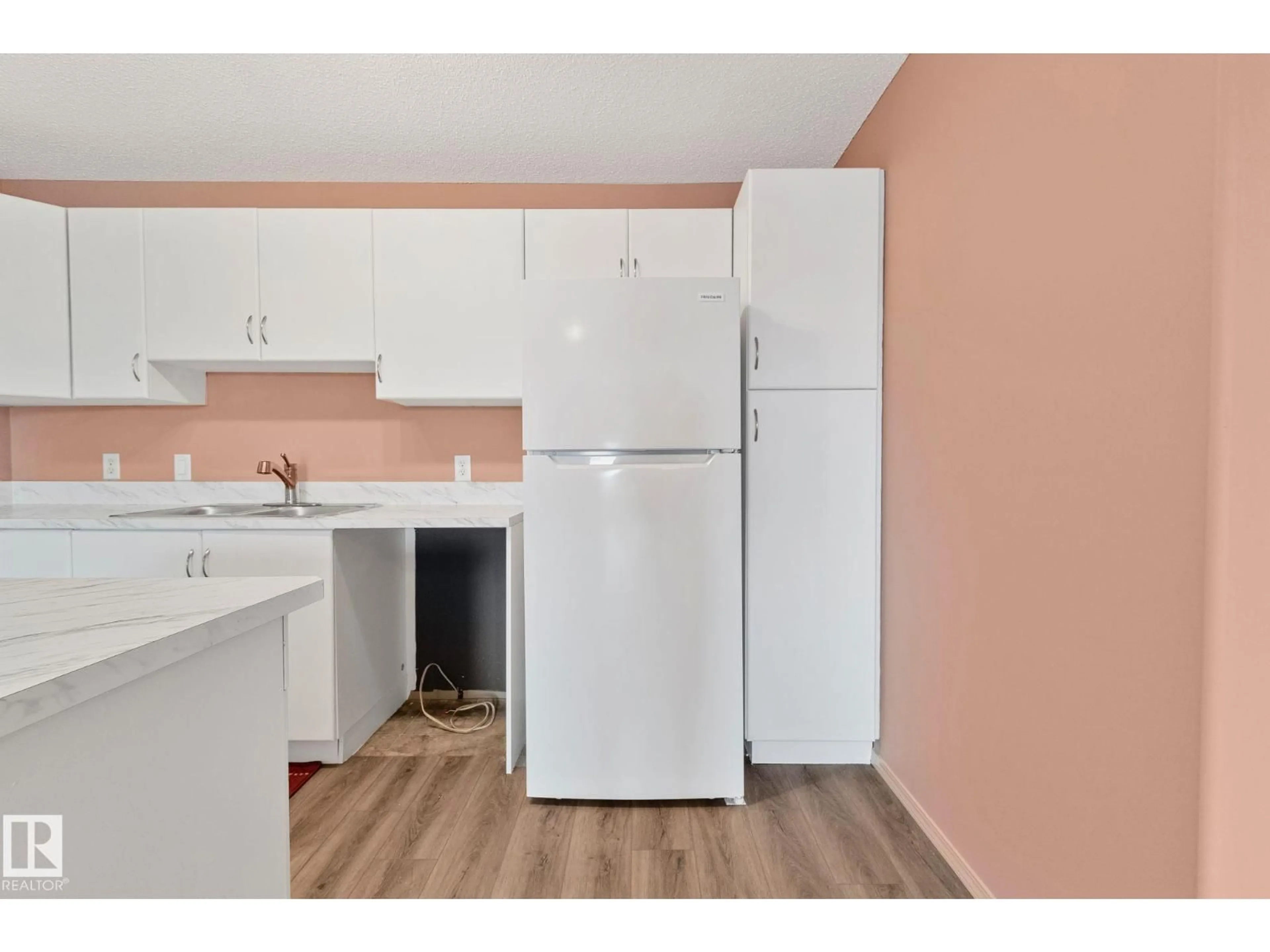 Standard kitchen, wood/laminate floor for #406 - 16035 132 ST NW, Edmonton Alberta T6V0B4