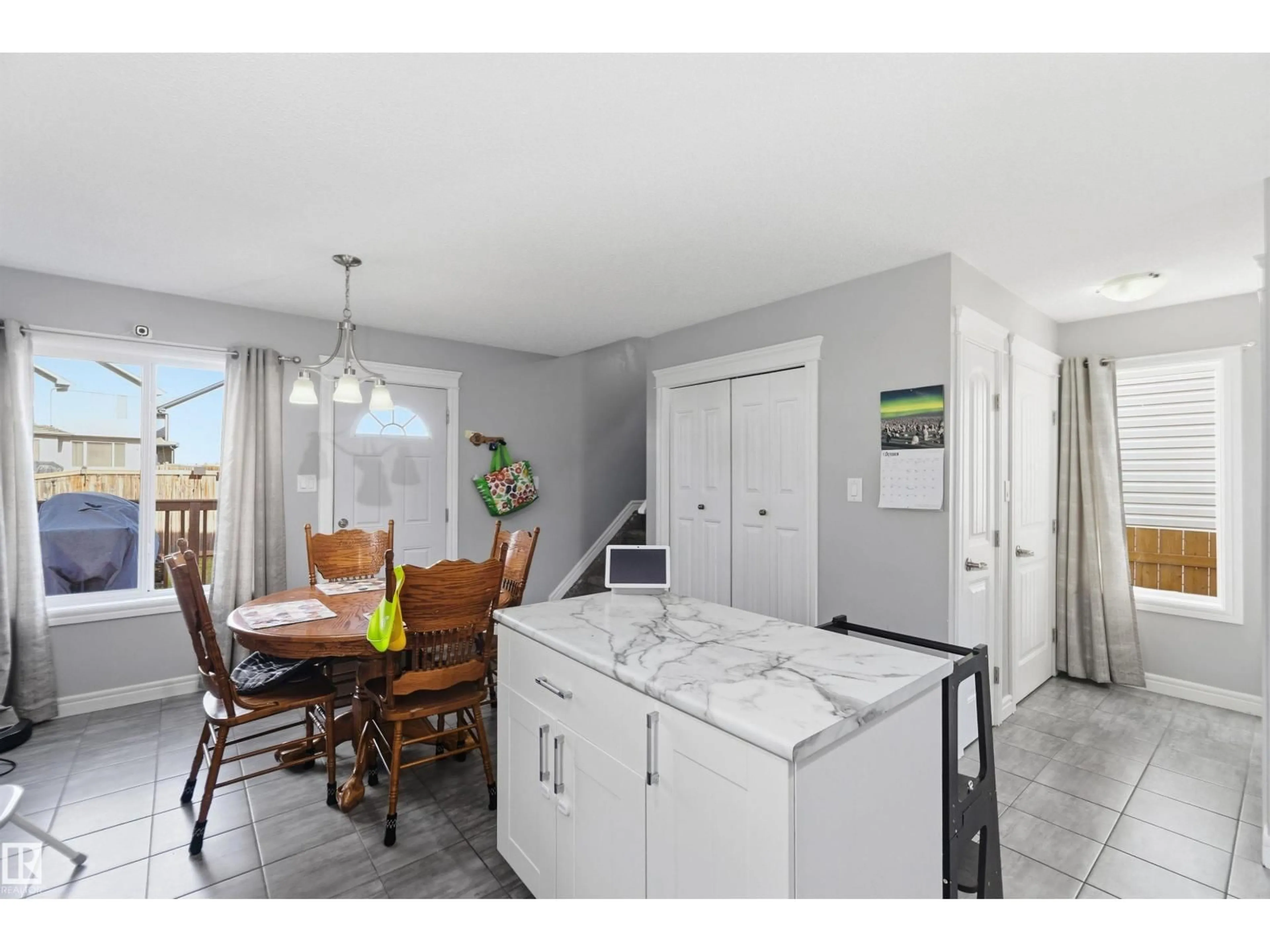 Open concept kitchen, ceramic/tile floor for NW - 3908 161 AV, Edmonton Alberta T5Y3J8