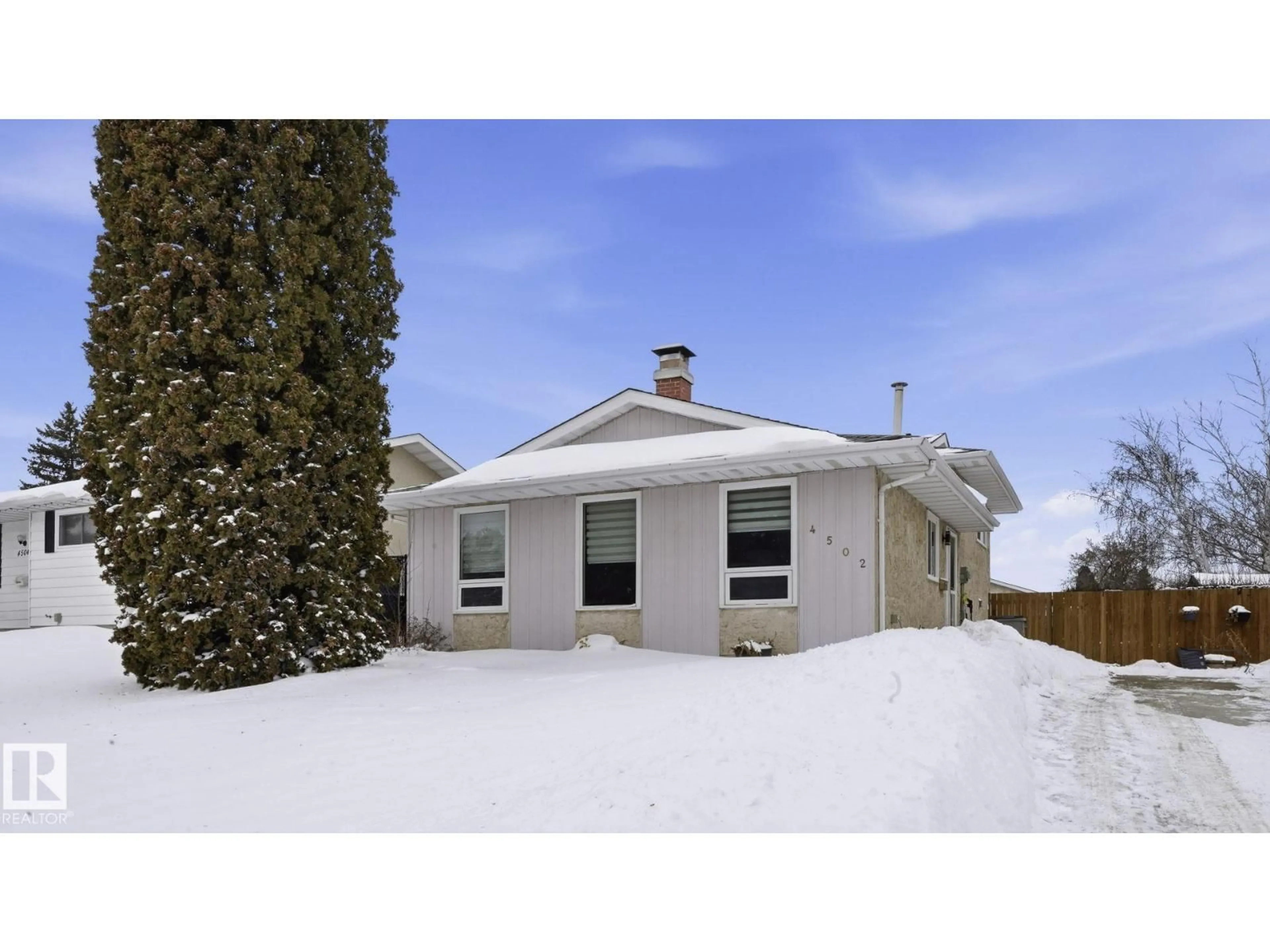 A pic from outside/outdoor area/front of a property/back of a property/a pic from drone, street for 4502 50A AV, Beaumont Alberta T4X1J3