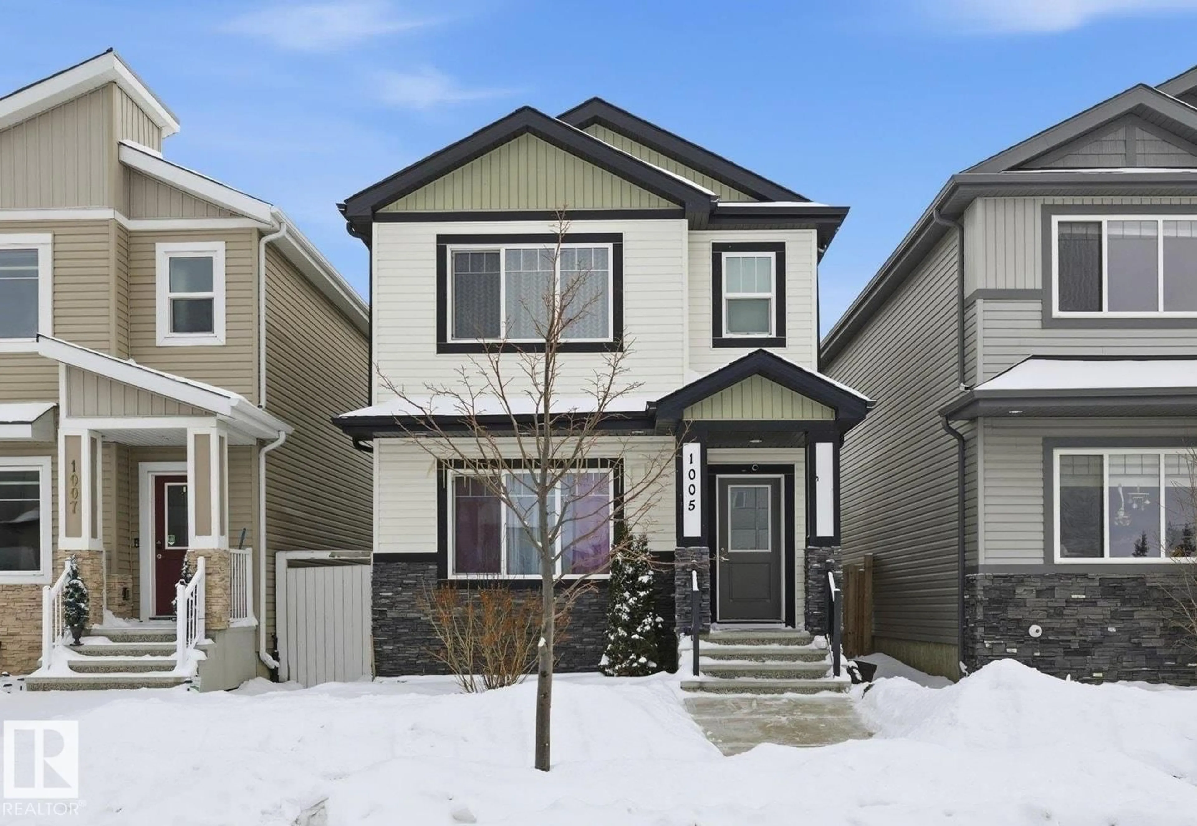 Home with vinyl exterior material, street for 1005 MCCONACHIE BV, Edmonton Alberta T5Y3N3