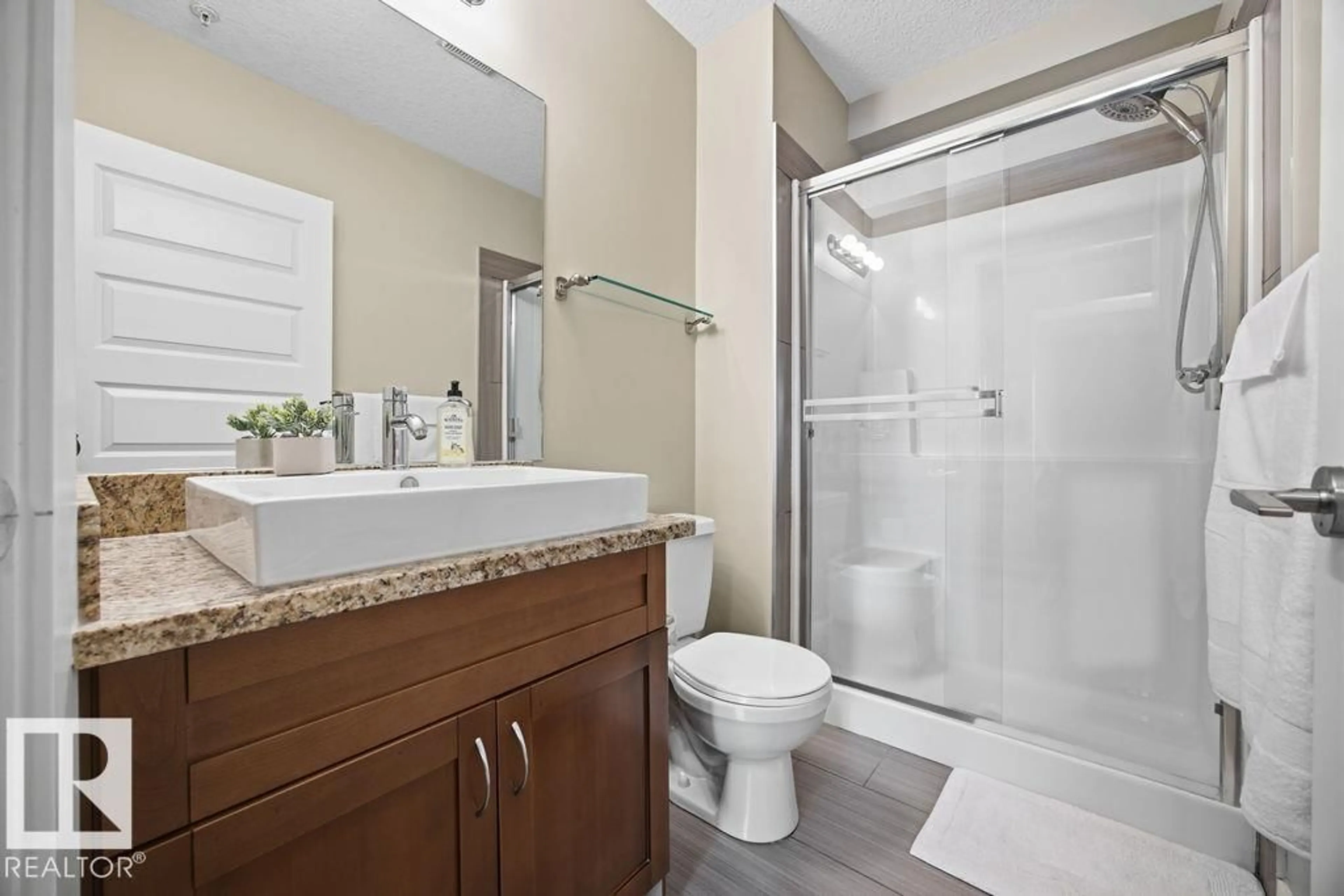 Standard bathroom, ceramic/tile floor for #112 - 1238 WINDERMERE WY, Edmonton Alberta T6W2J3