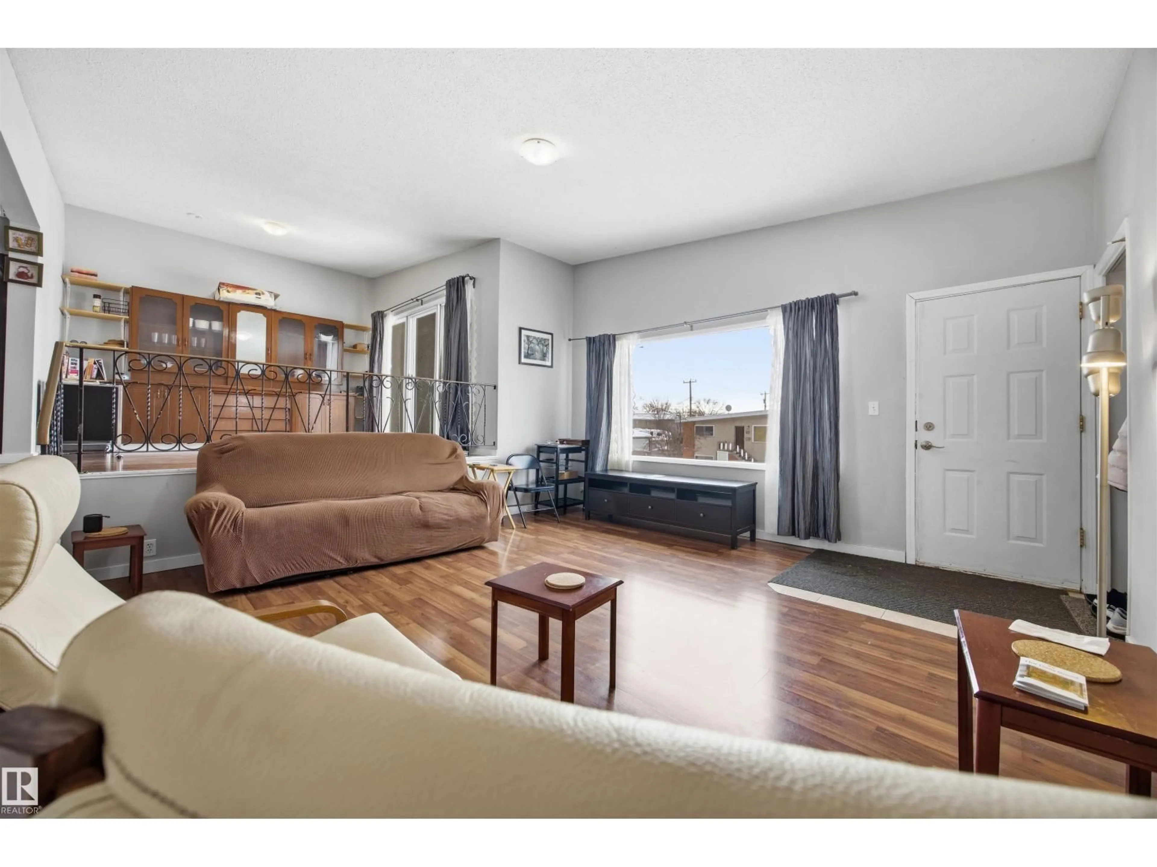 Living room with furniture, unknown for 7918 121 AV, Edmonton Alberta T5B0Y8