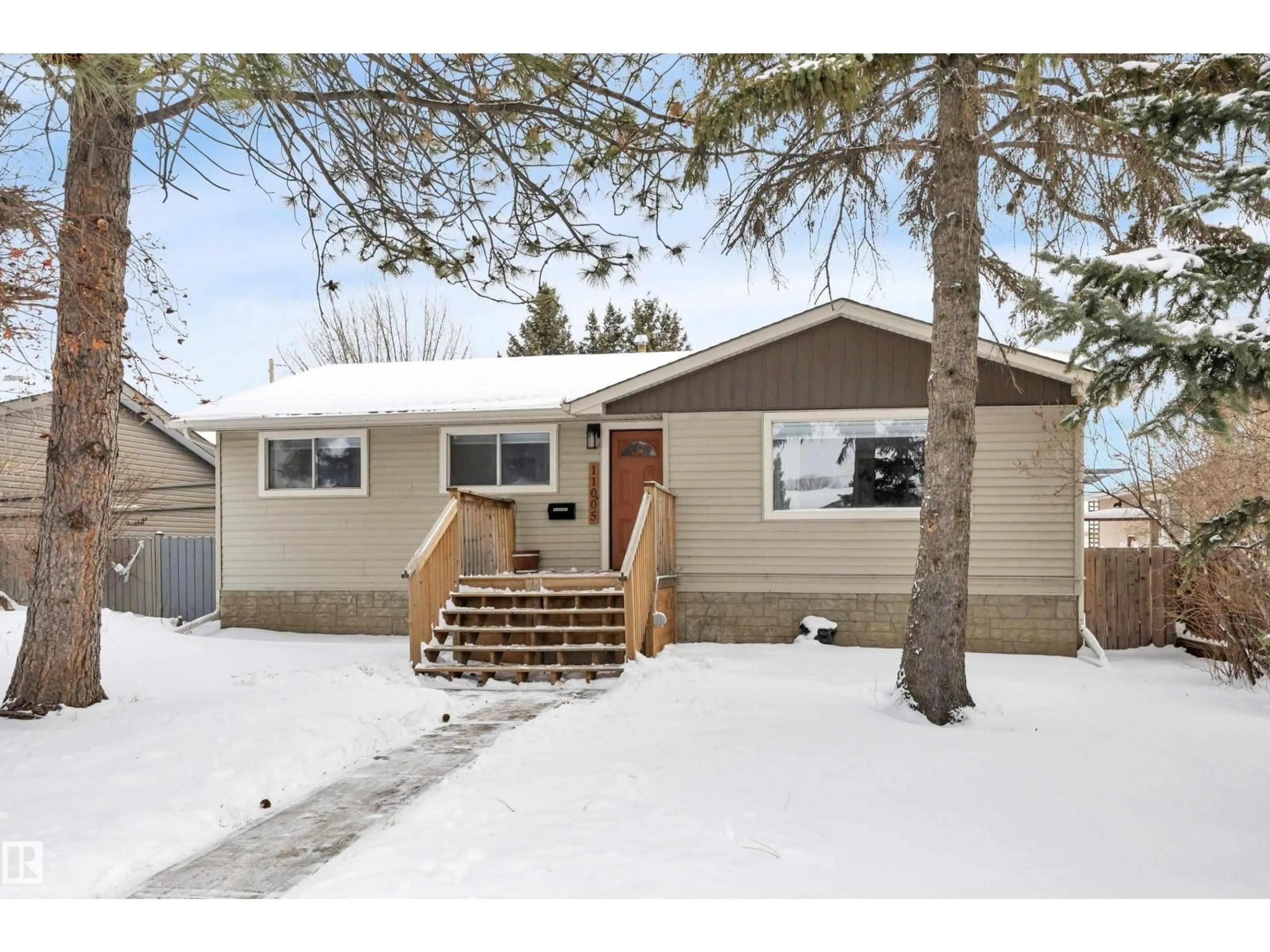 Home with vinyl exterior material, street for NW - 11005 155 ST, Edmonton Alberta T5P2N4