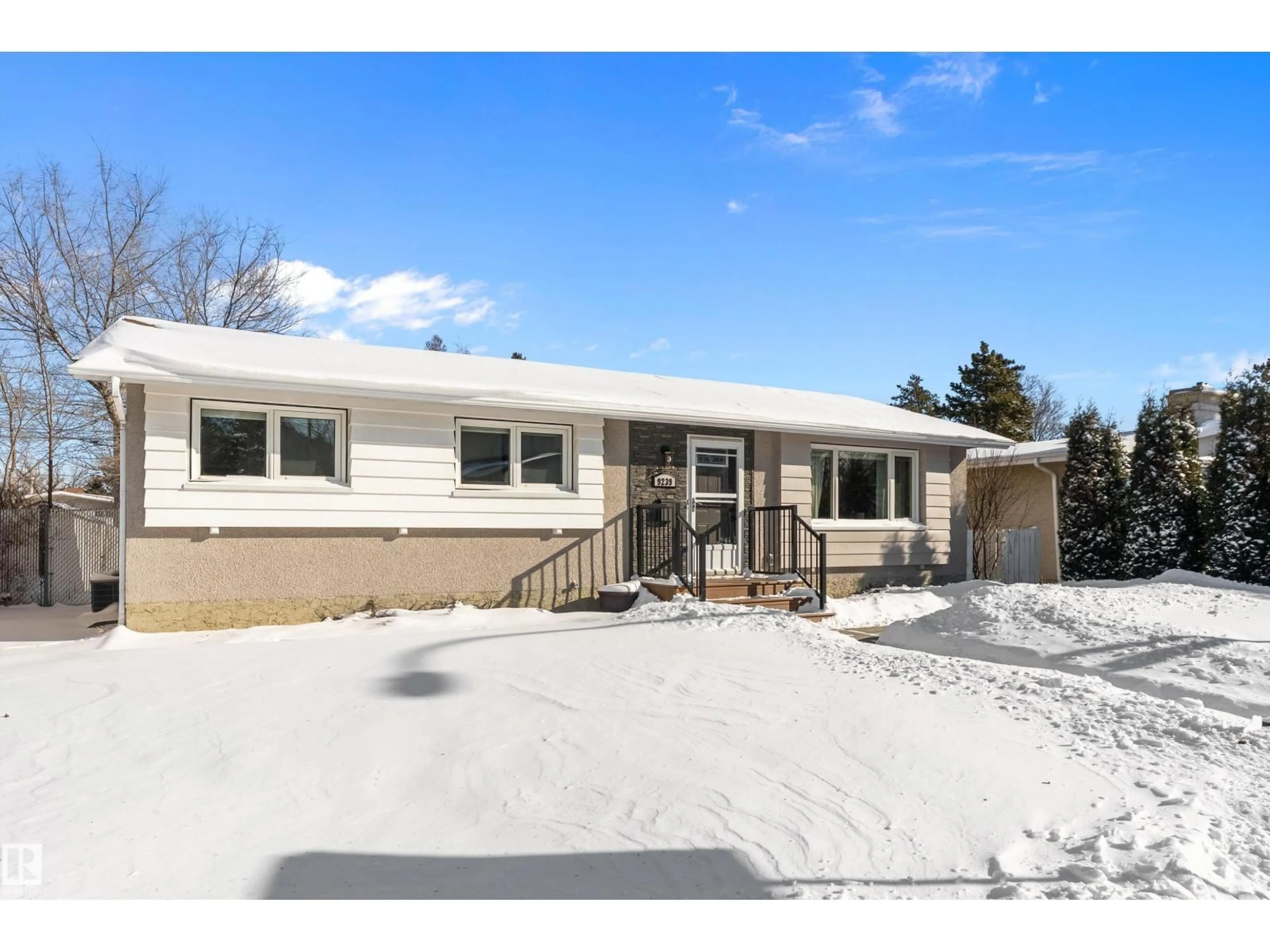 Home with vinyl exterior material, street for 9239 OTTEWELL RD, Edmonton Alberta T6B2C8