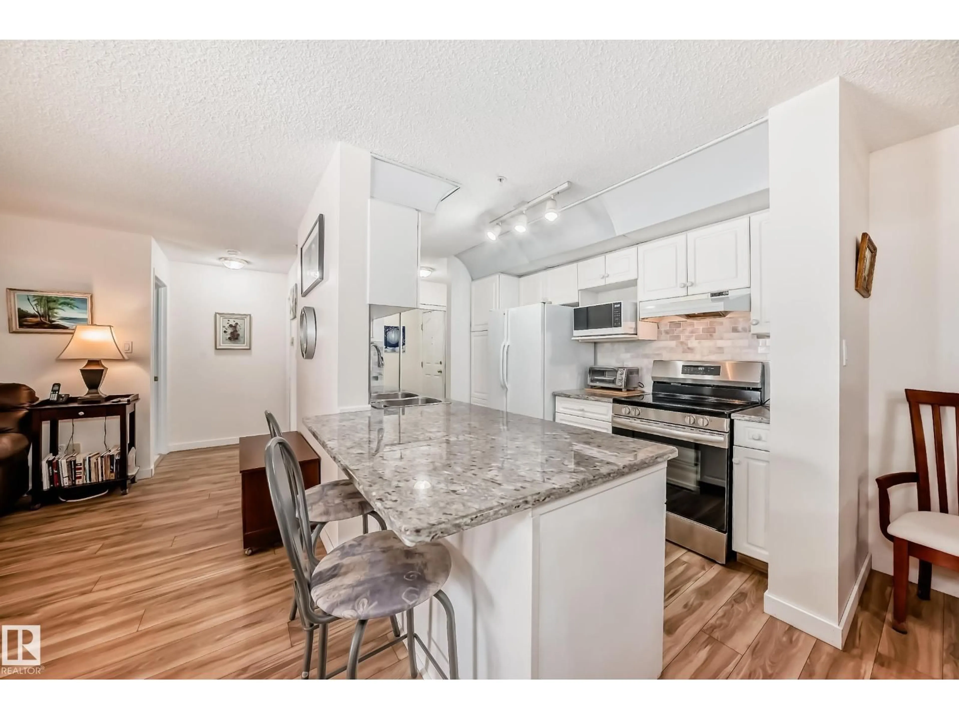 Open concept kitchen, unknown for 121 17459 98A AV, Edmonton Alberta T5T6H8
