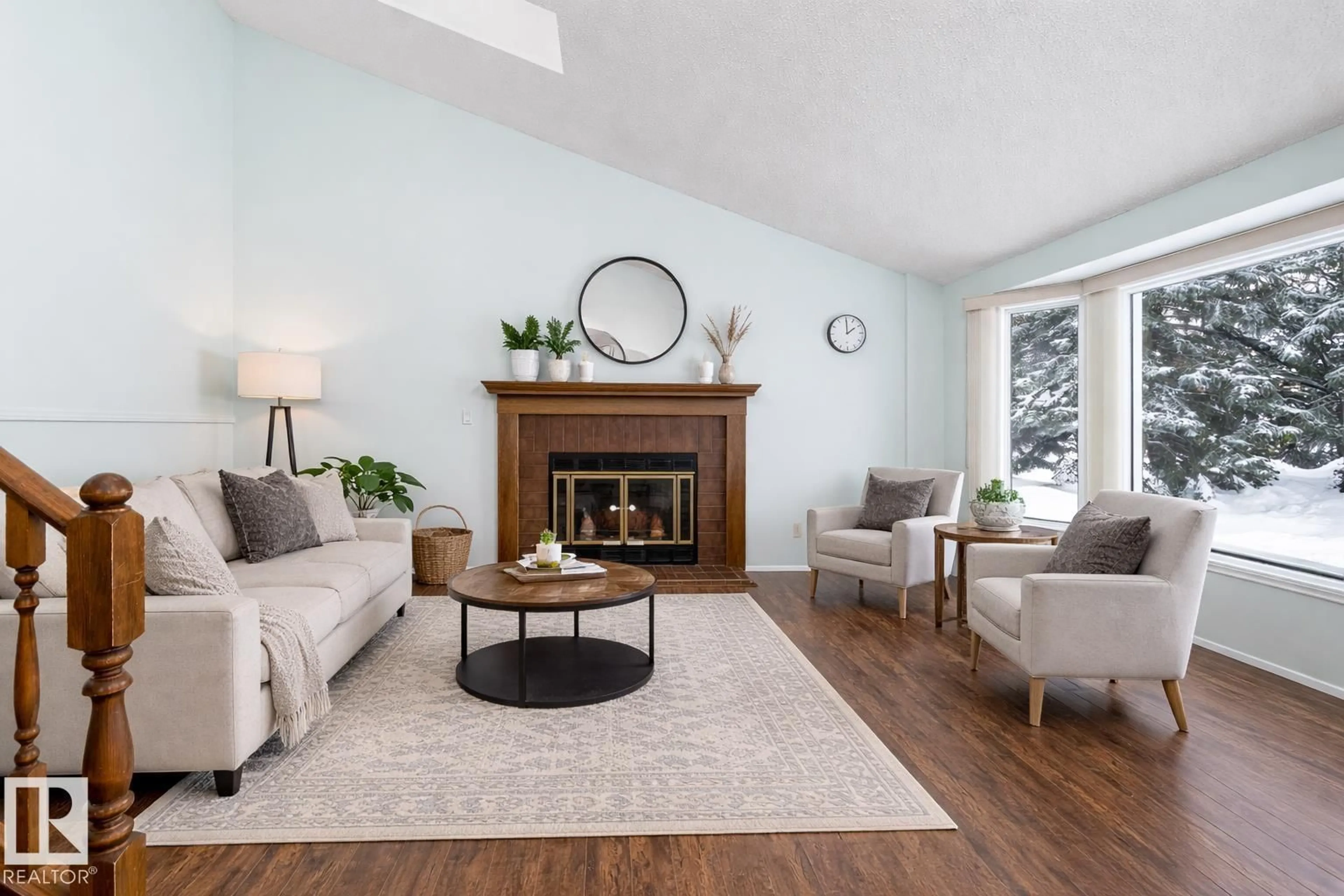 Living room with furniture, wood/laminate floor for 1511 104 ST, Edmonton Alberta T6J5T2