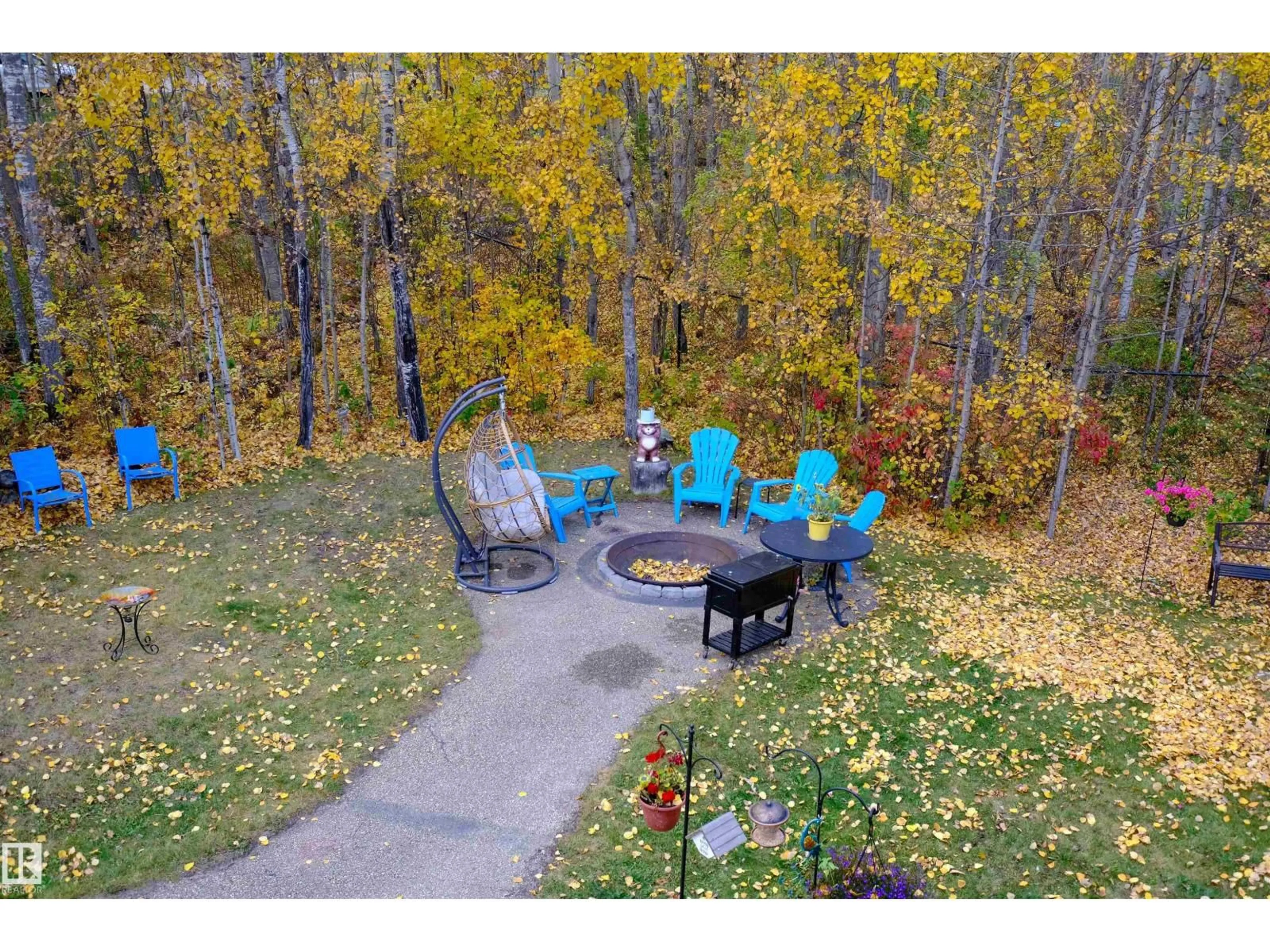 A pic from outside/outdoor area/front of a property/back of a property/a pic from drone, forest/trees view for 23 - 4224 TWP ROAD 545, Rural Lac Ste. Anne County Alberta T0E0A2