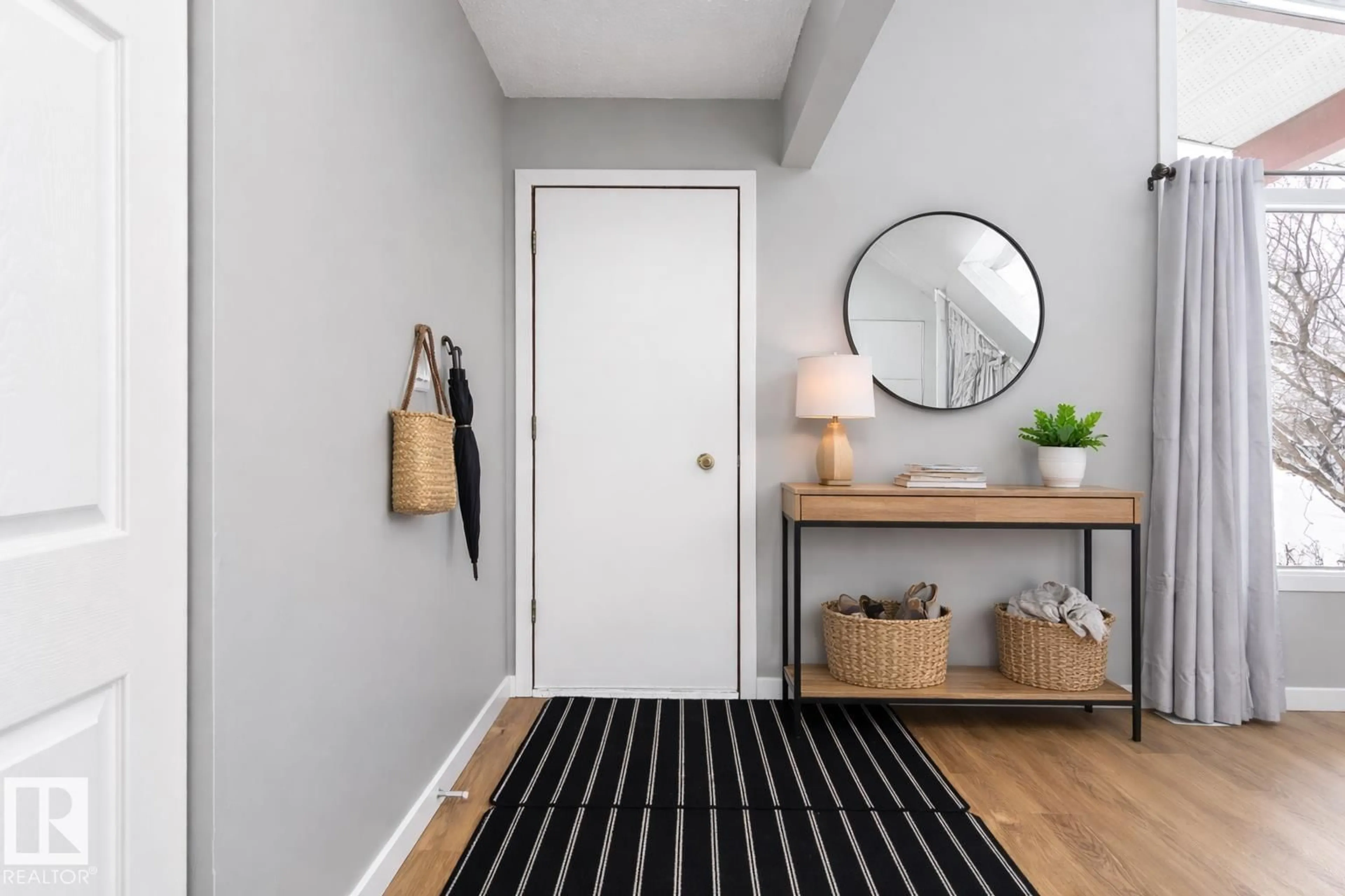 Indoor entryway for 11436 143 AV, Edmonton Alberta T5X1L6