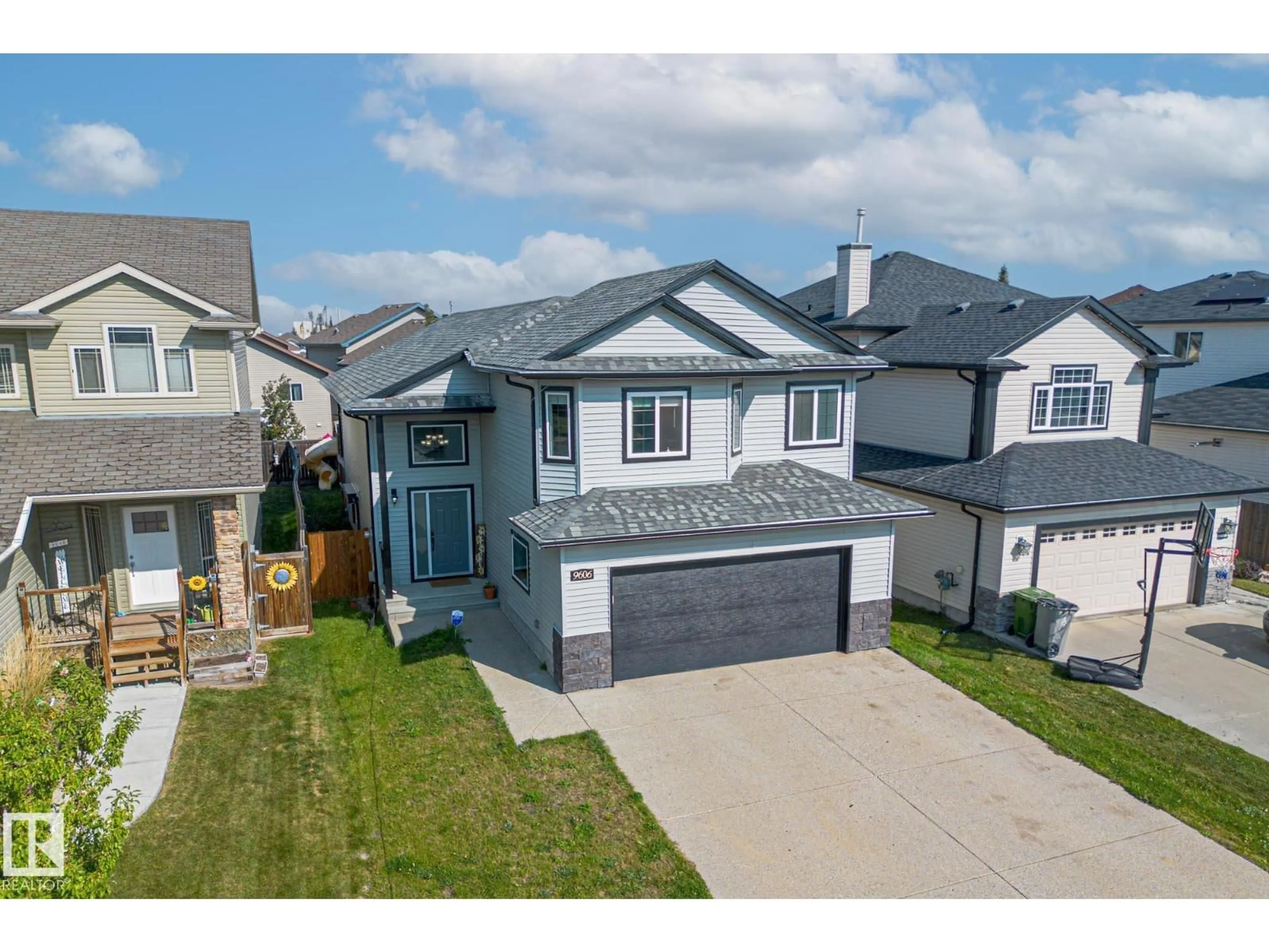 A pic from outside/outdoor area/front of a property/back of a property/a pic from drone, street for 9606 83 AV, Morinville Alberta T8R0A6