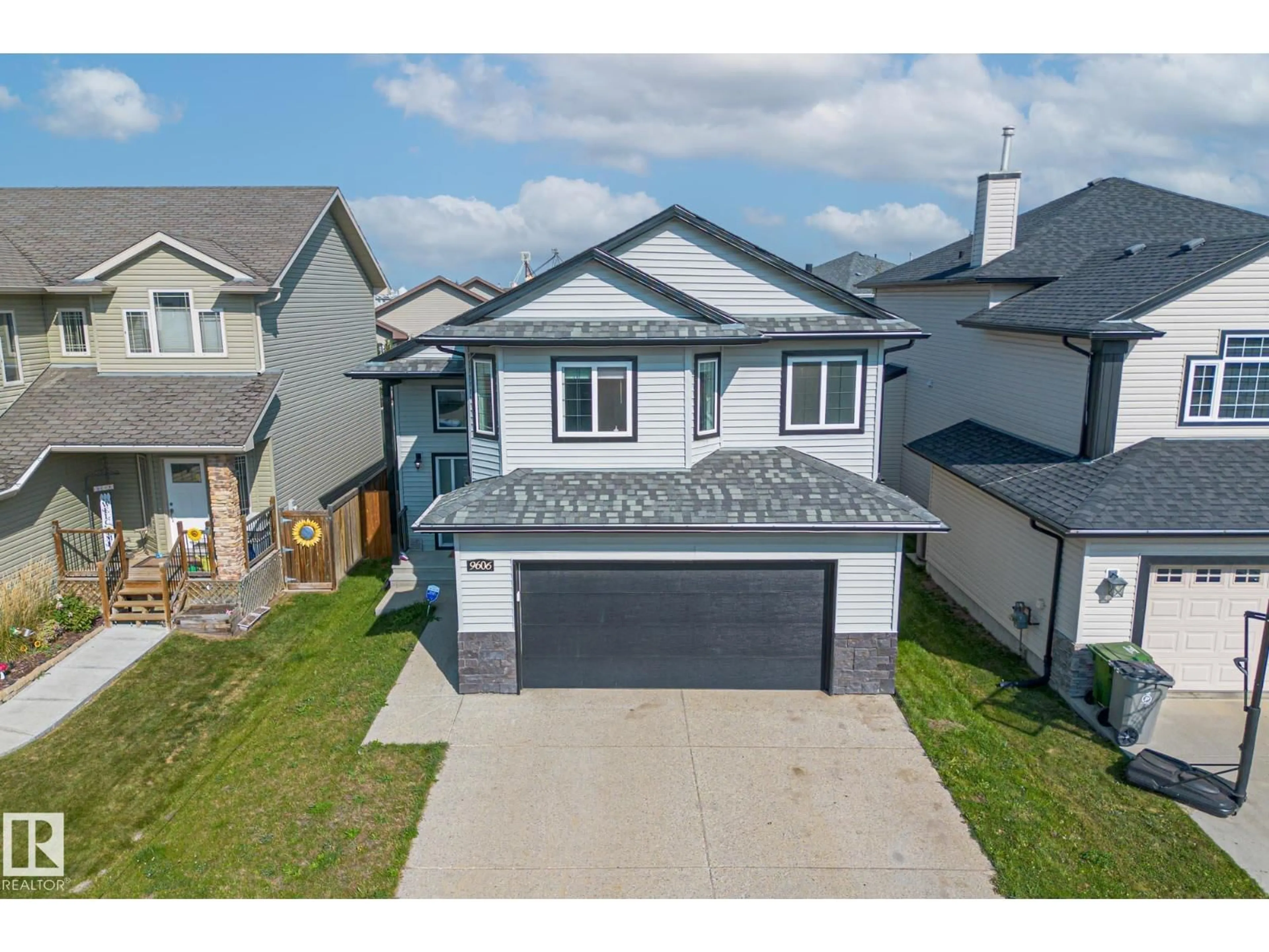 A pic from outside/outdoor area/front of a property/back of a property/a pic from drone, street for 9606 83 AV, Morinville Alberta T8R0A6