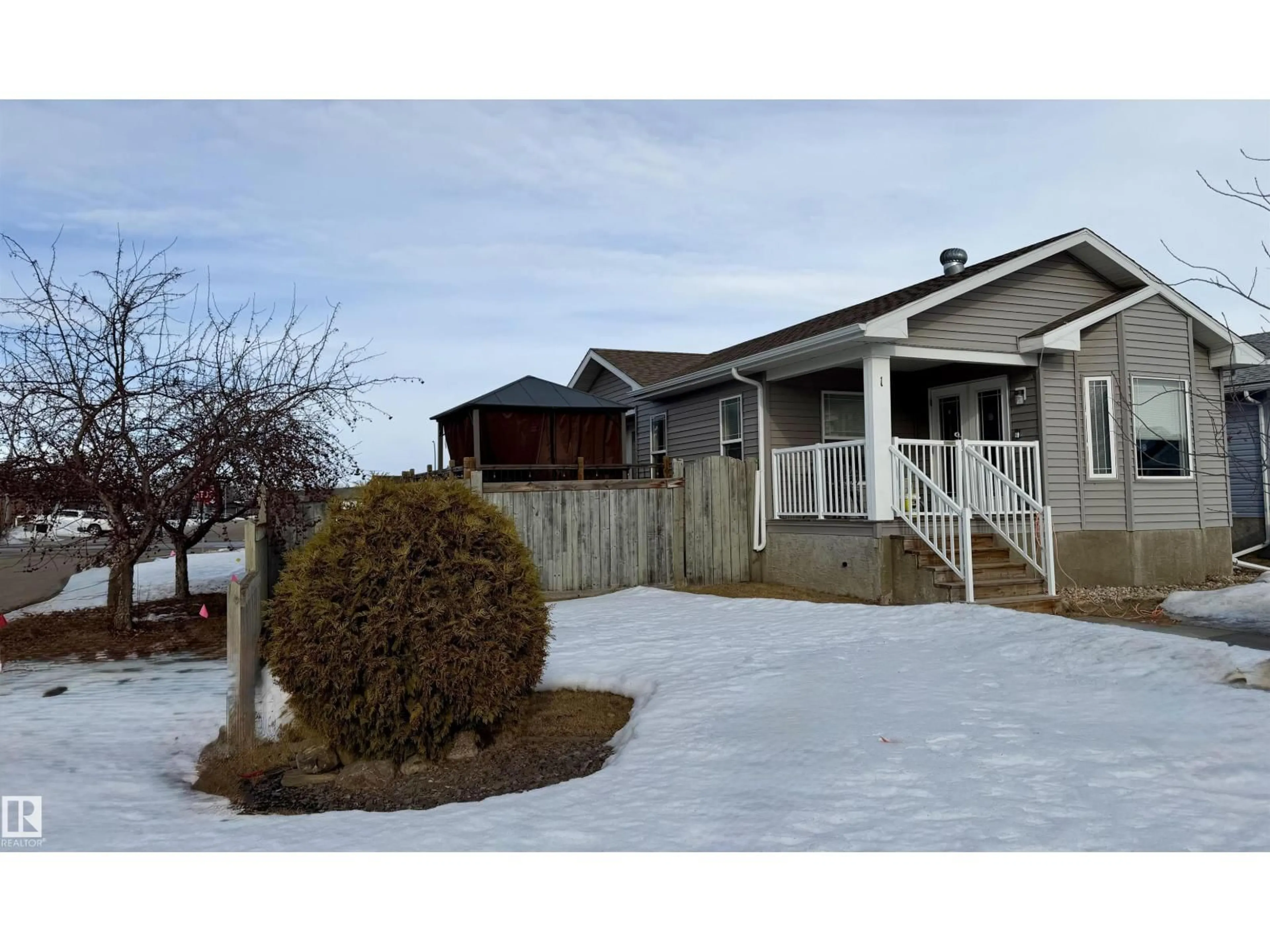 Home with vinyl exterior material, street for 1 JUTLAND CR, Stony Plain Alberta T7Z0A3
