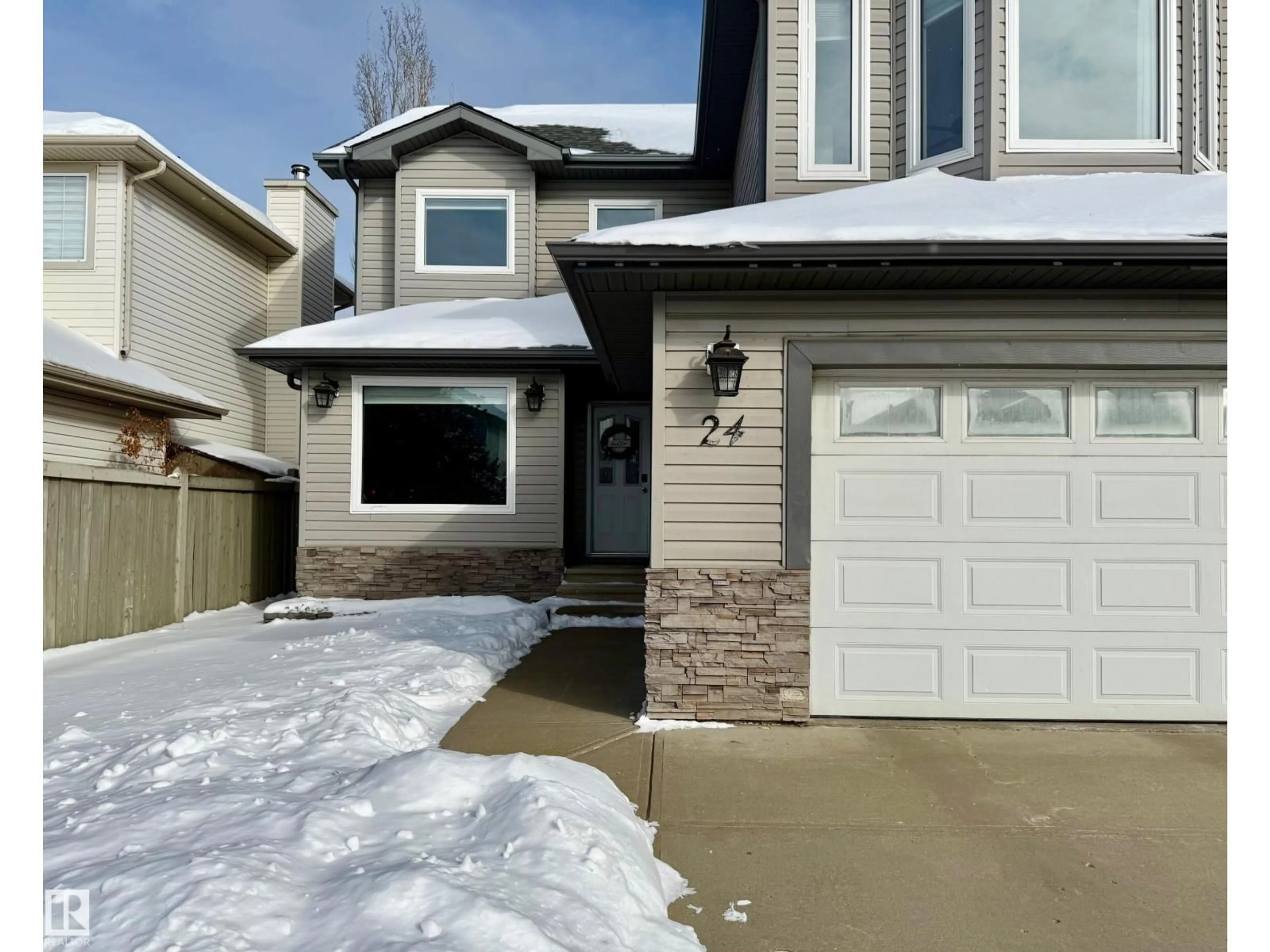 Home with vinyl exterior material, street for 24 PIPESTONE DR, Devon Alberta T9G1S1
