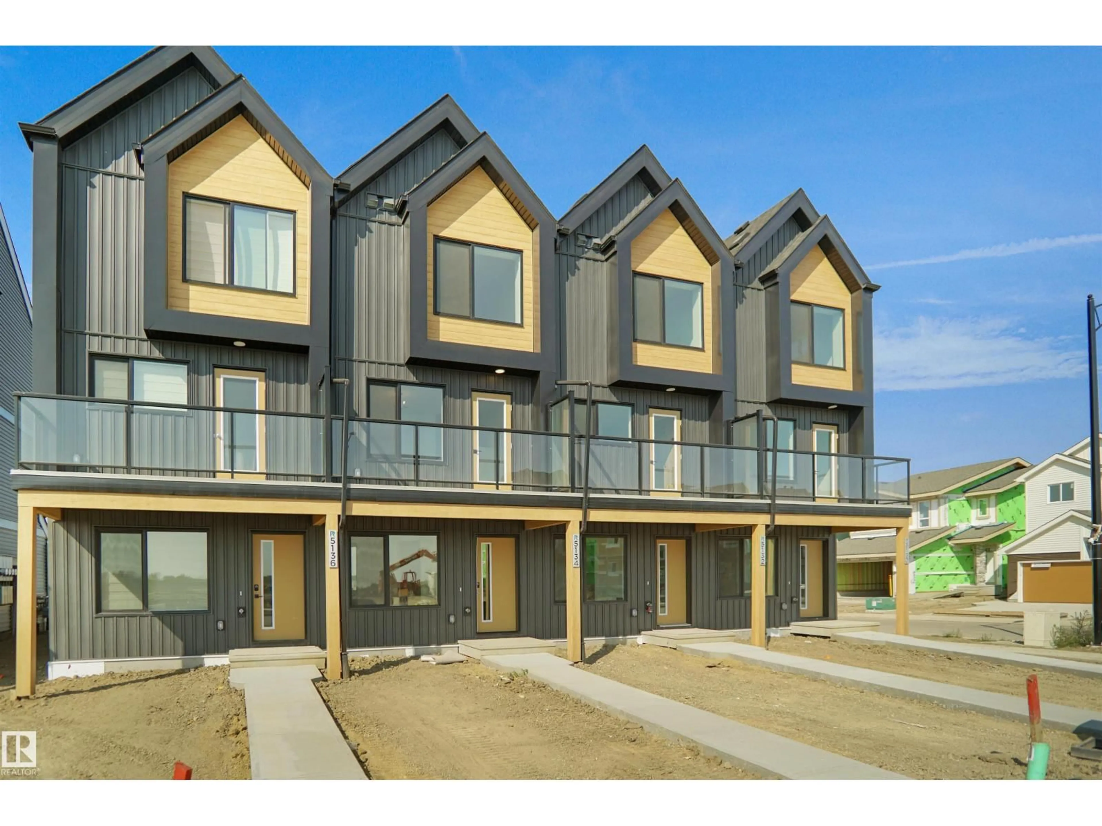 A pic from outside/outdoor area/front of a property/back of a property/a pic from drone, street for 5158 RIVER'S EDGE WY, Edmonton Alberta T6M3B5