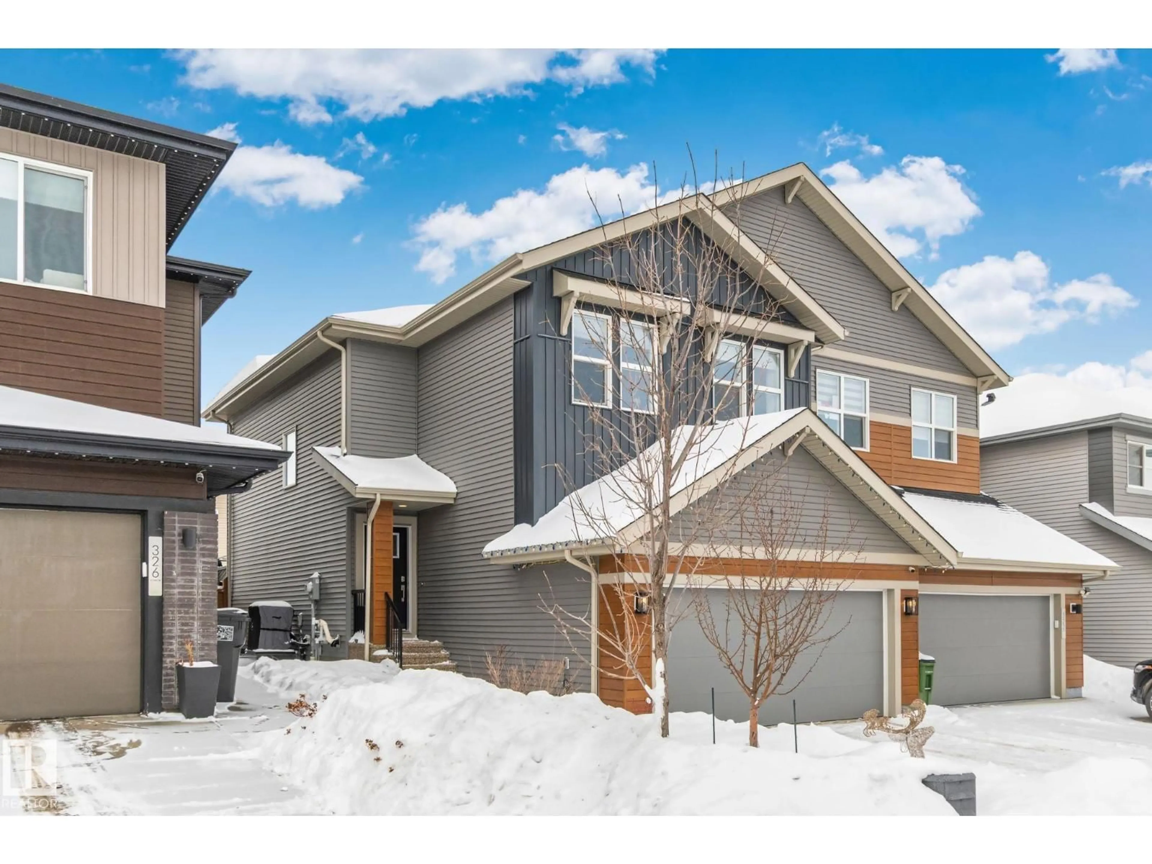 Home with vinyl exterior material, street for SW - 324 41 ST, Edmonton Alberta T6X2L8