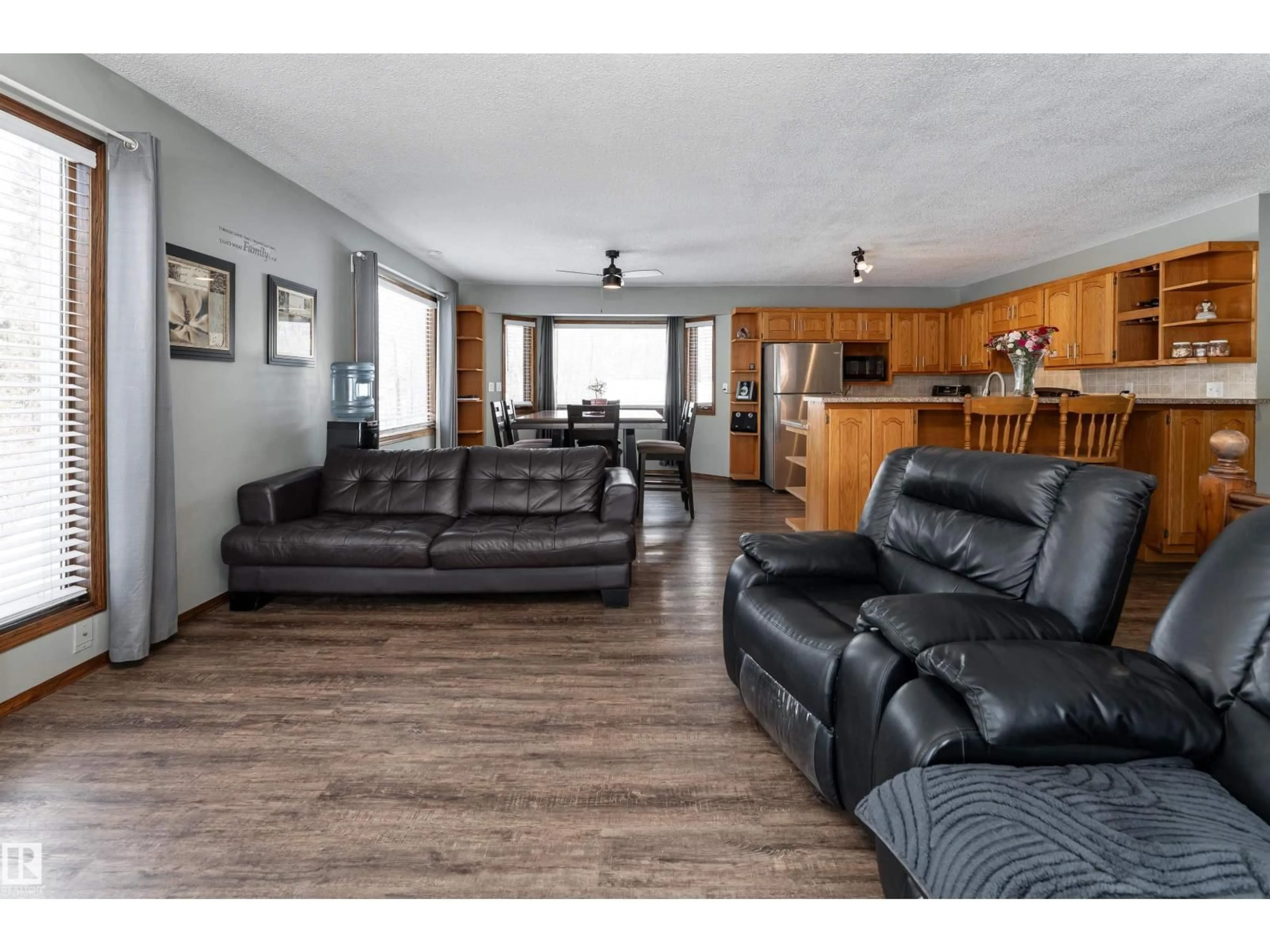 Living room with furniture, wood/laminate floor for 4 - 2228 PARKLAND DR, Rural Parkland County Alberta T7Y2L2