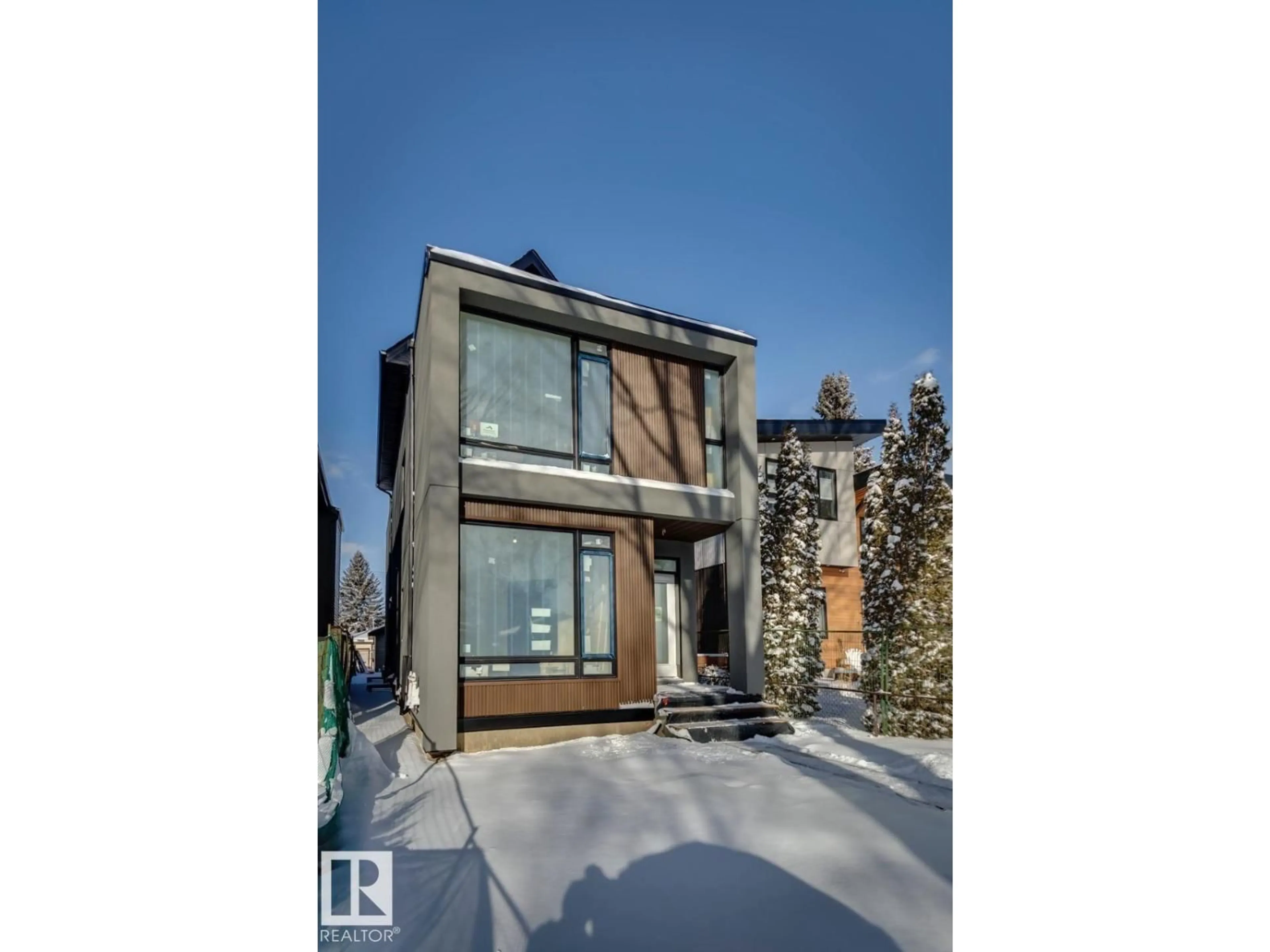 Home with brick exterior material, street for 7928 97 AV, Edmonton Alberta T6C2B7