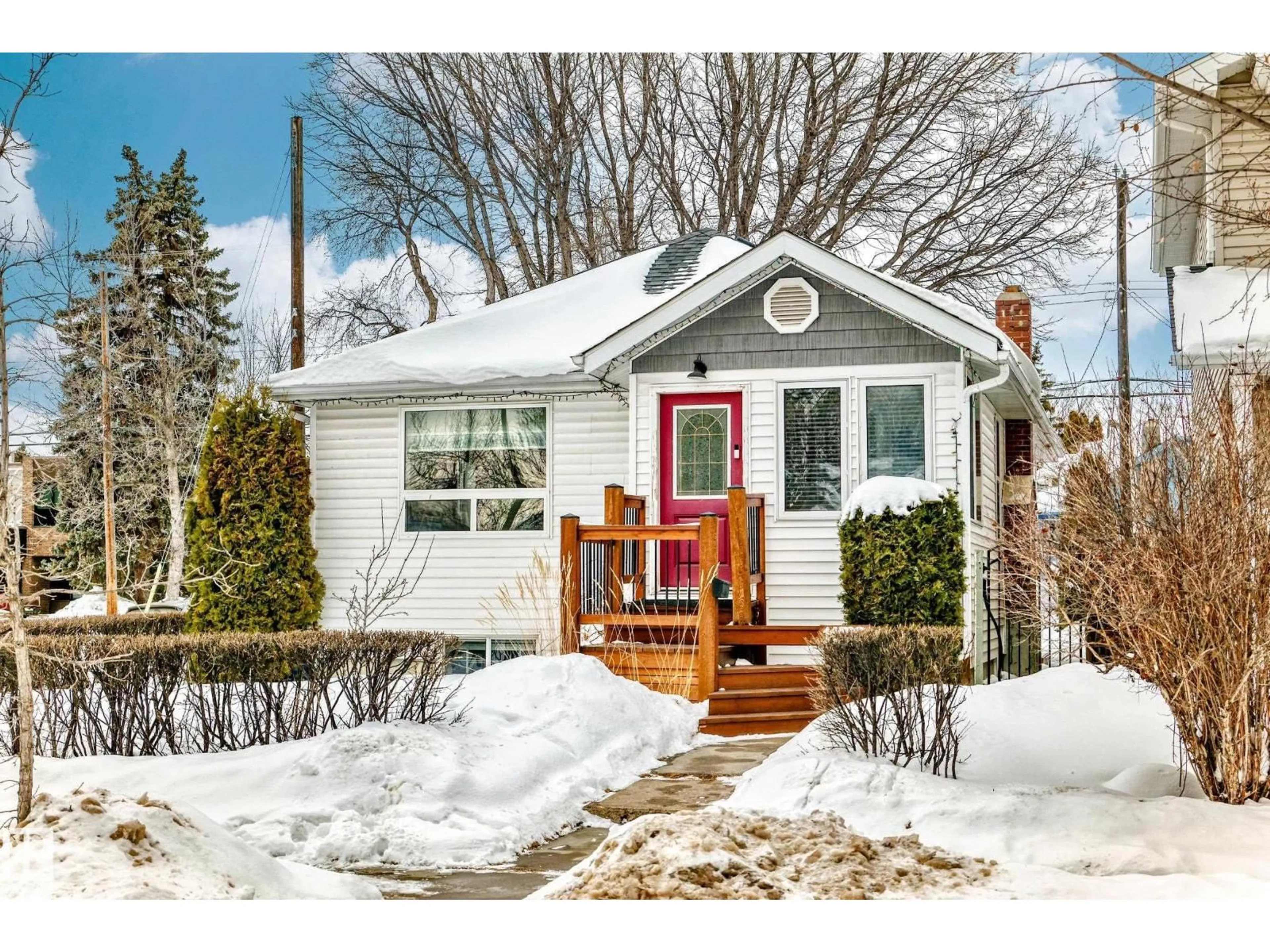 Home with vinyl exterior material, street for 14536 103 AV, Edmonton Alberta T5N0T4