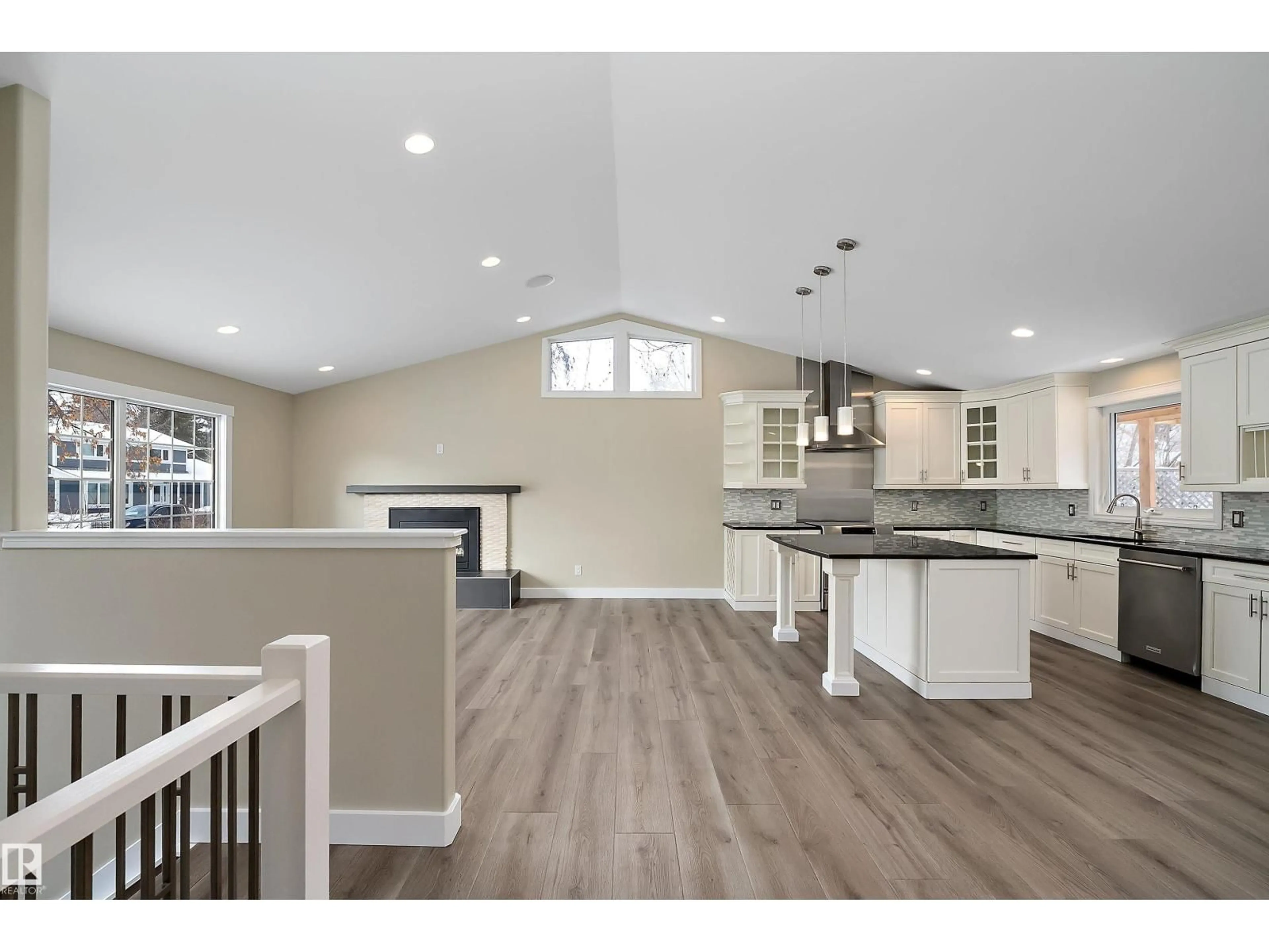 Open concept kitchen, wood/laminate floor for NW - 4207 123 ST, Edmonton Alberta T6J1Z7