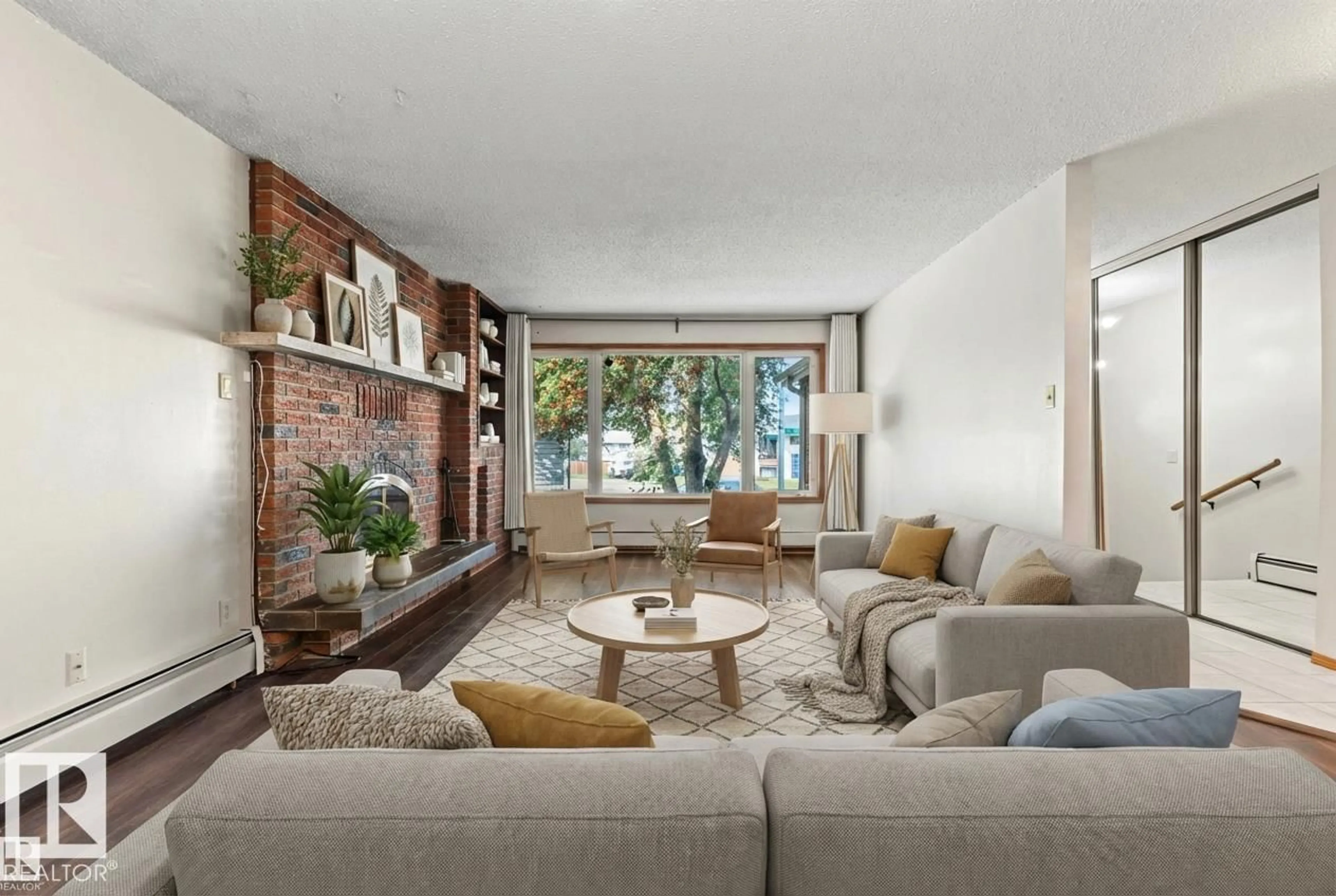 Living room with furniture, unknown for 3503 20 AV, Edmonton Alberta T6L3E2