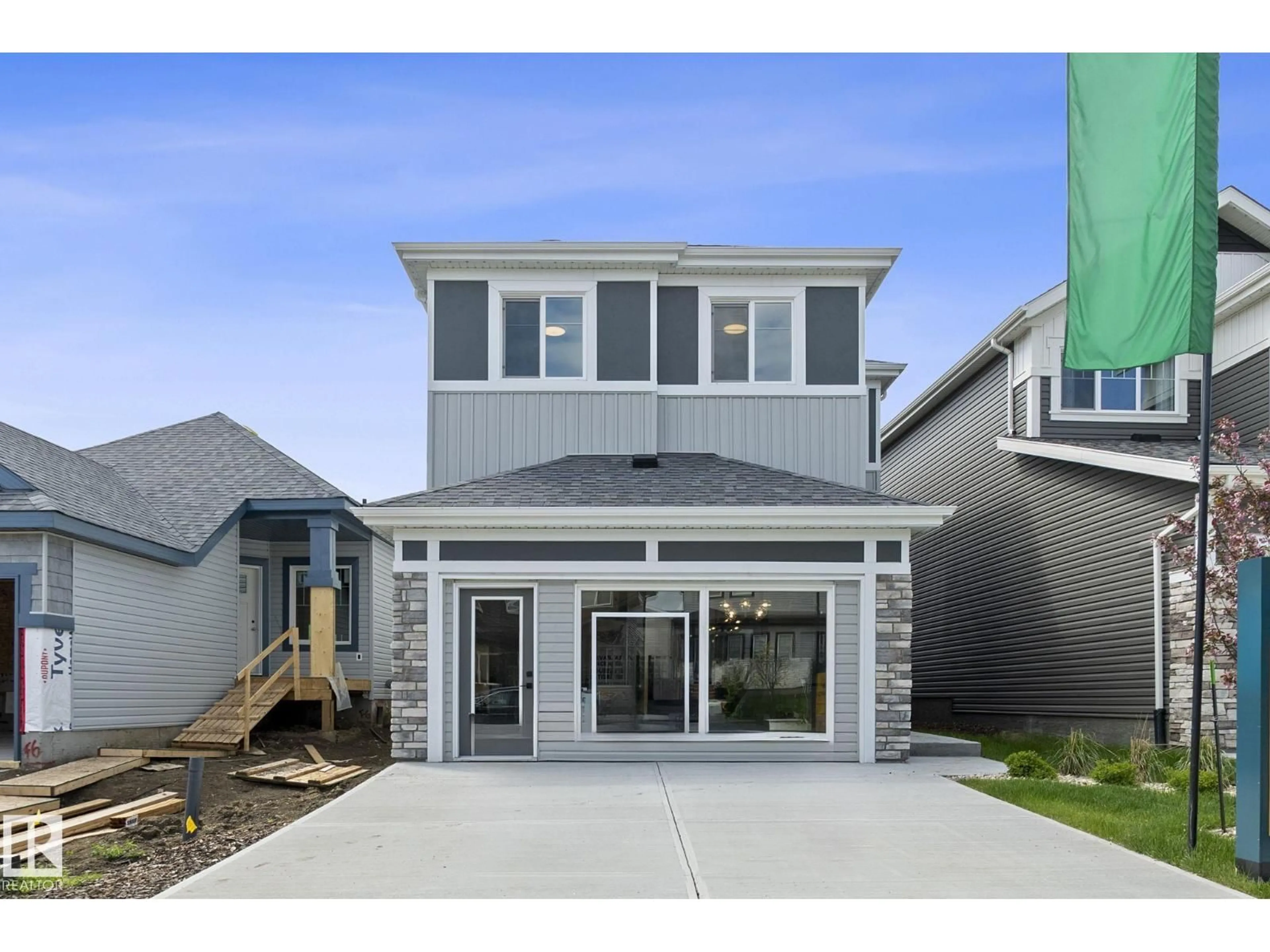 Home with vinyl exterior material, street for 103 DANSEREAU WY, Beaumont Alberta T4X3E2