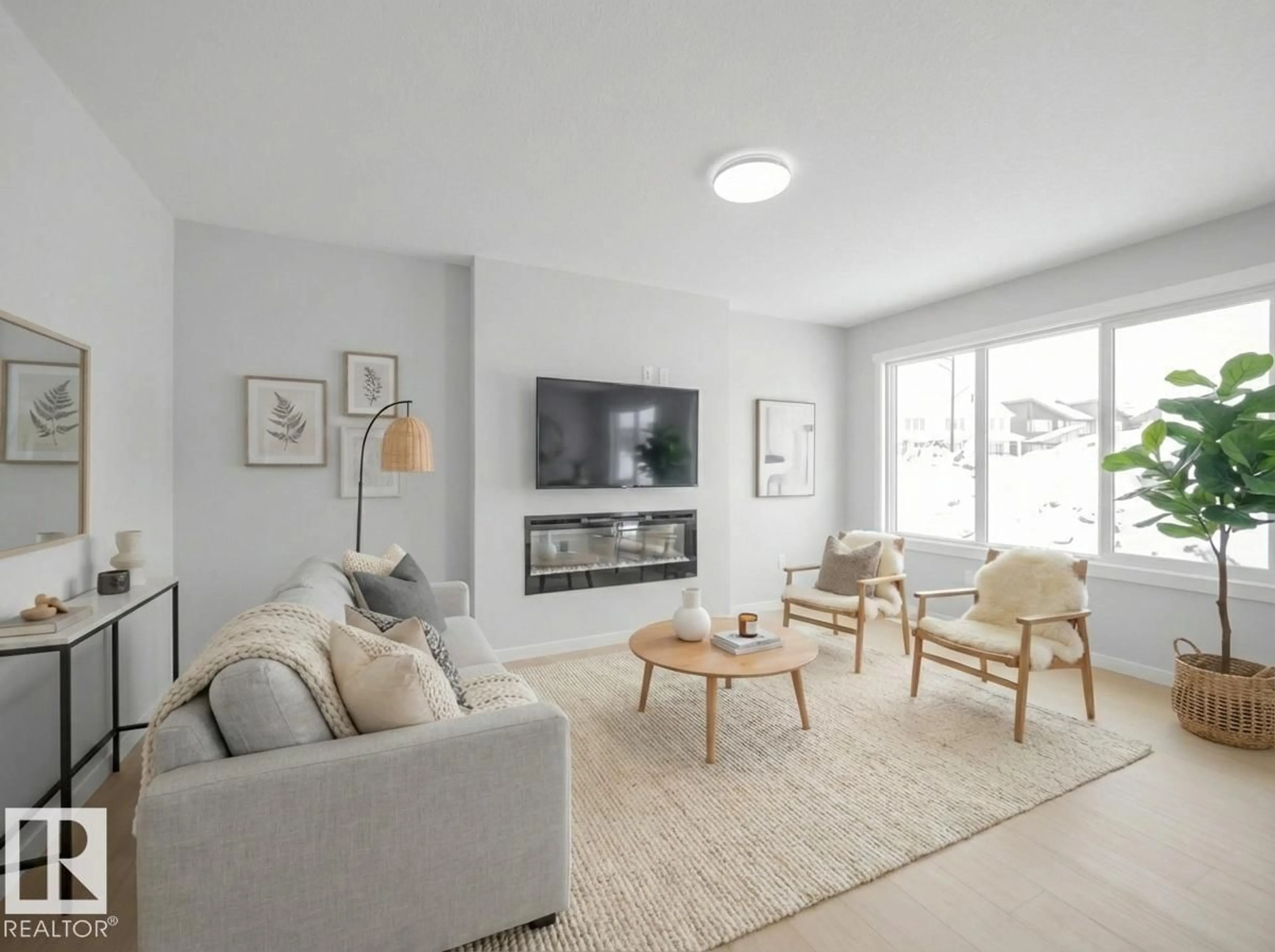 Living room with furniture, unknown for NW - 348 172 AV, Edmonton Alberta T5Y4K9