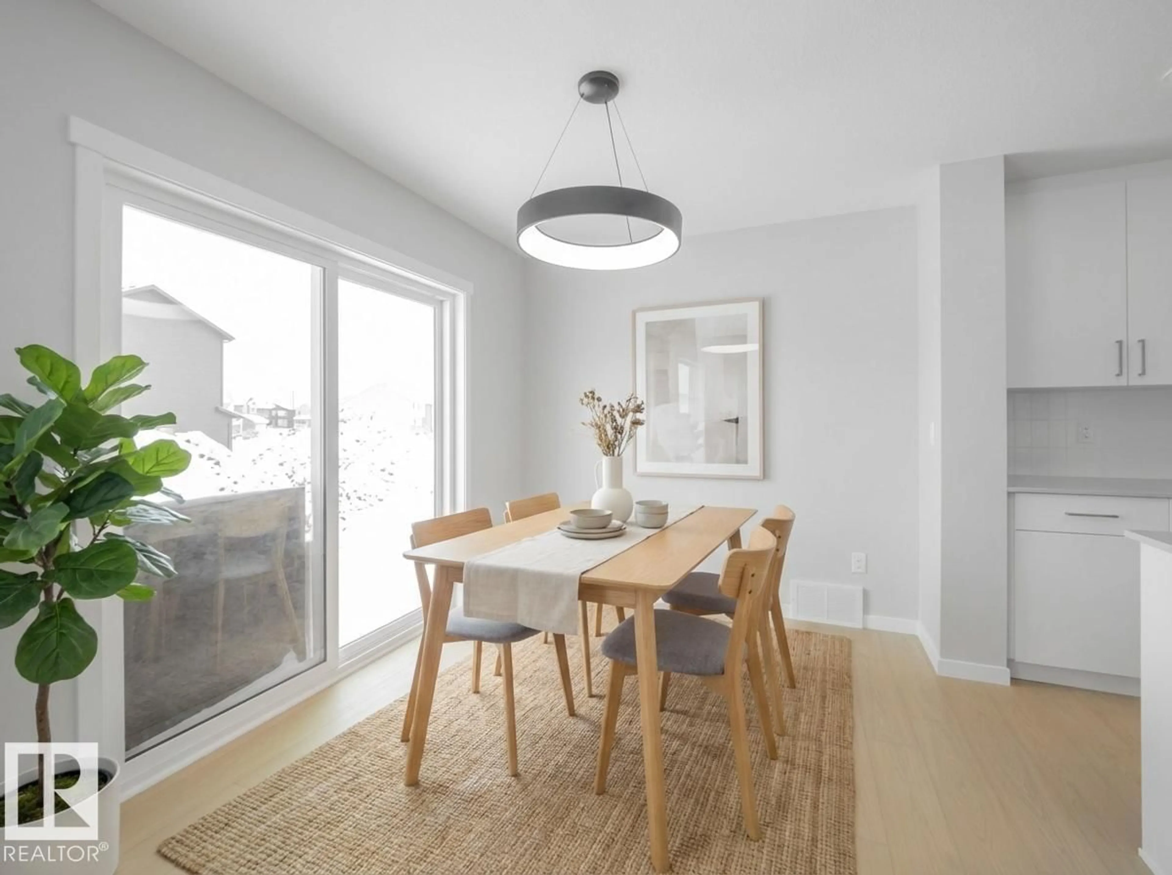 Dining room, wood/laminate floor for NW - 348 172 AV, Edmonton Alberta T5Y4K9