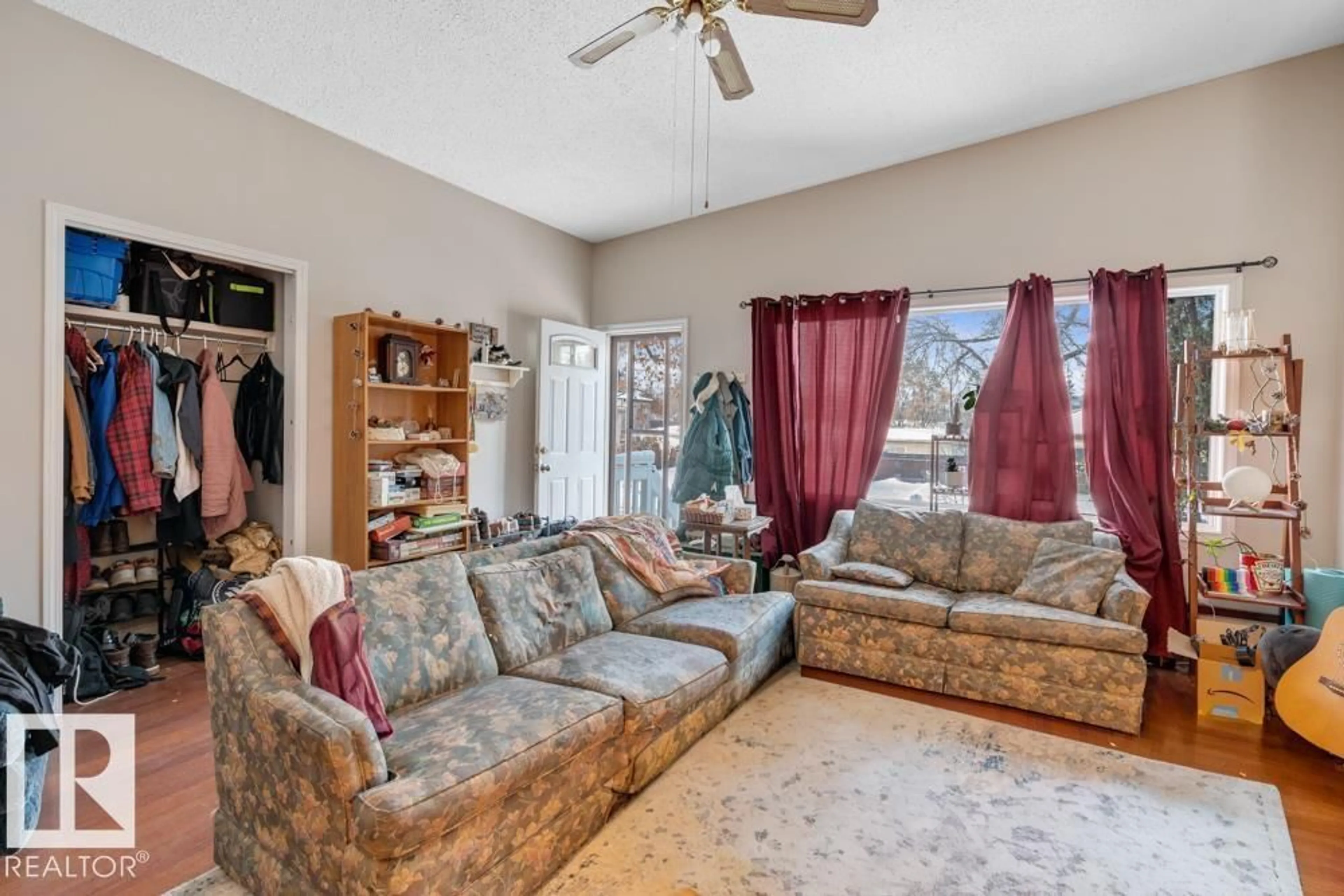 Living room with furniture, unknown for 8705-8707 122 AV, Edmonton Alberta T5B4R8