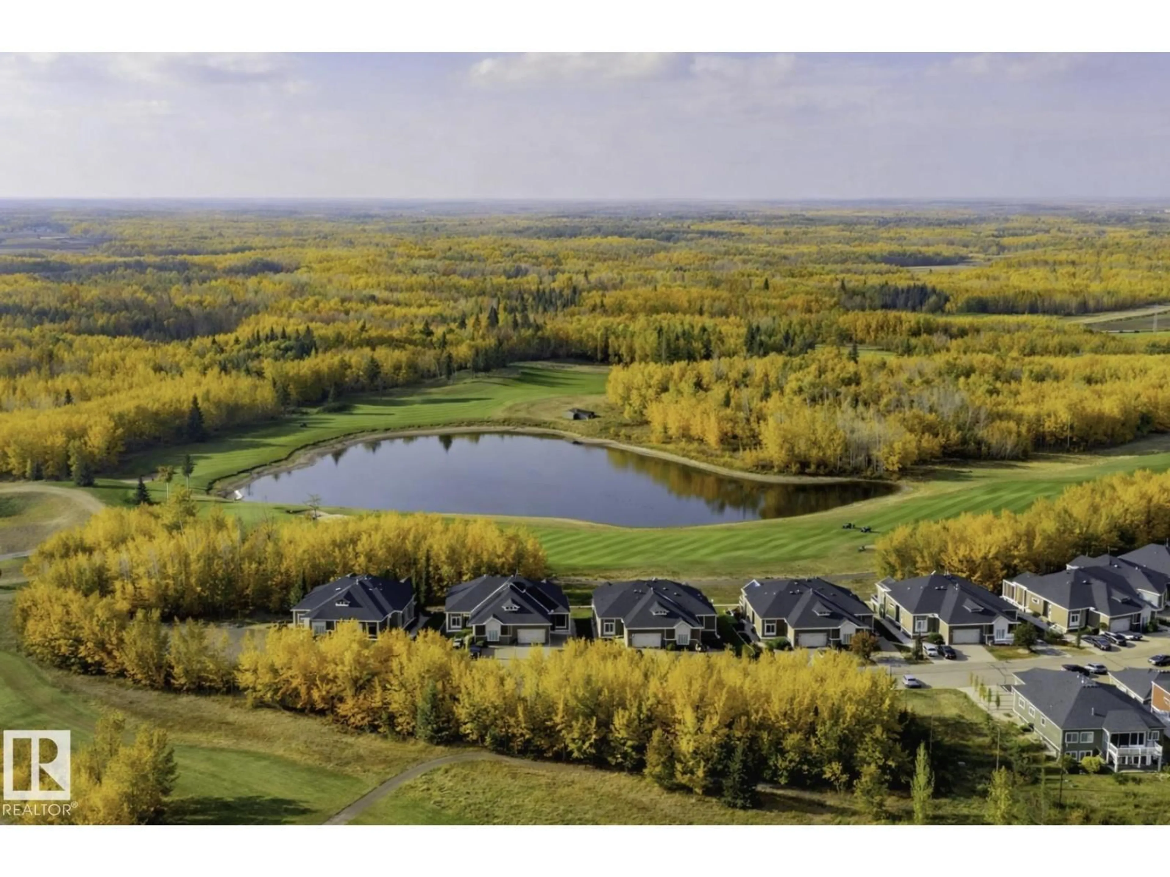 A pic from outside/outdoor area/front of a property/back of a property/a pic from drone, water/lake/river/ocean view for #336 - 51101 R 222 RD, Rural Strathcona County Alberta T8C1G9