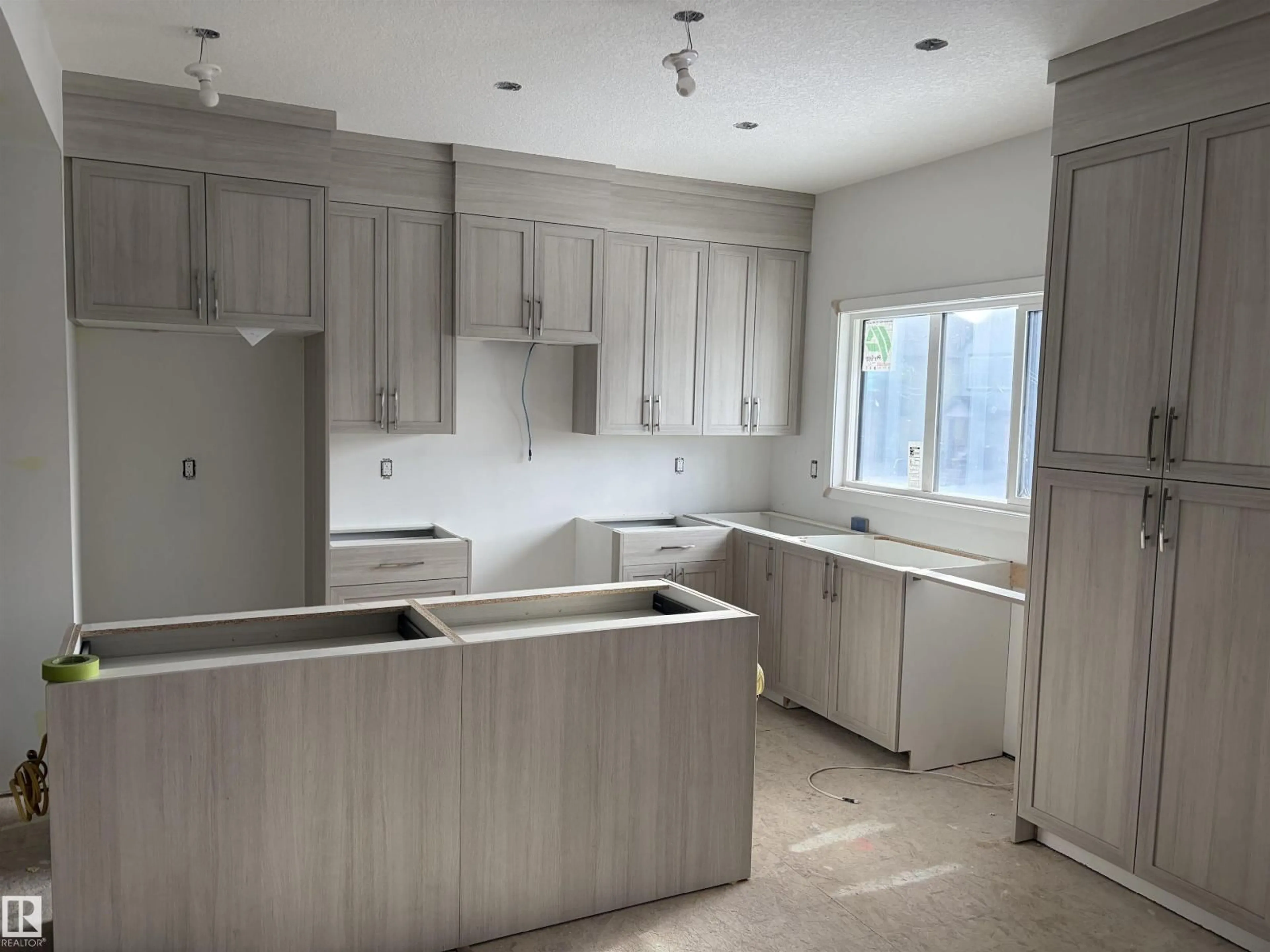 Open concept kitchen, unknown for 8923 ELVES LO, Edmonton Alberta T6M0T8