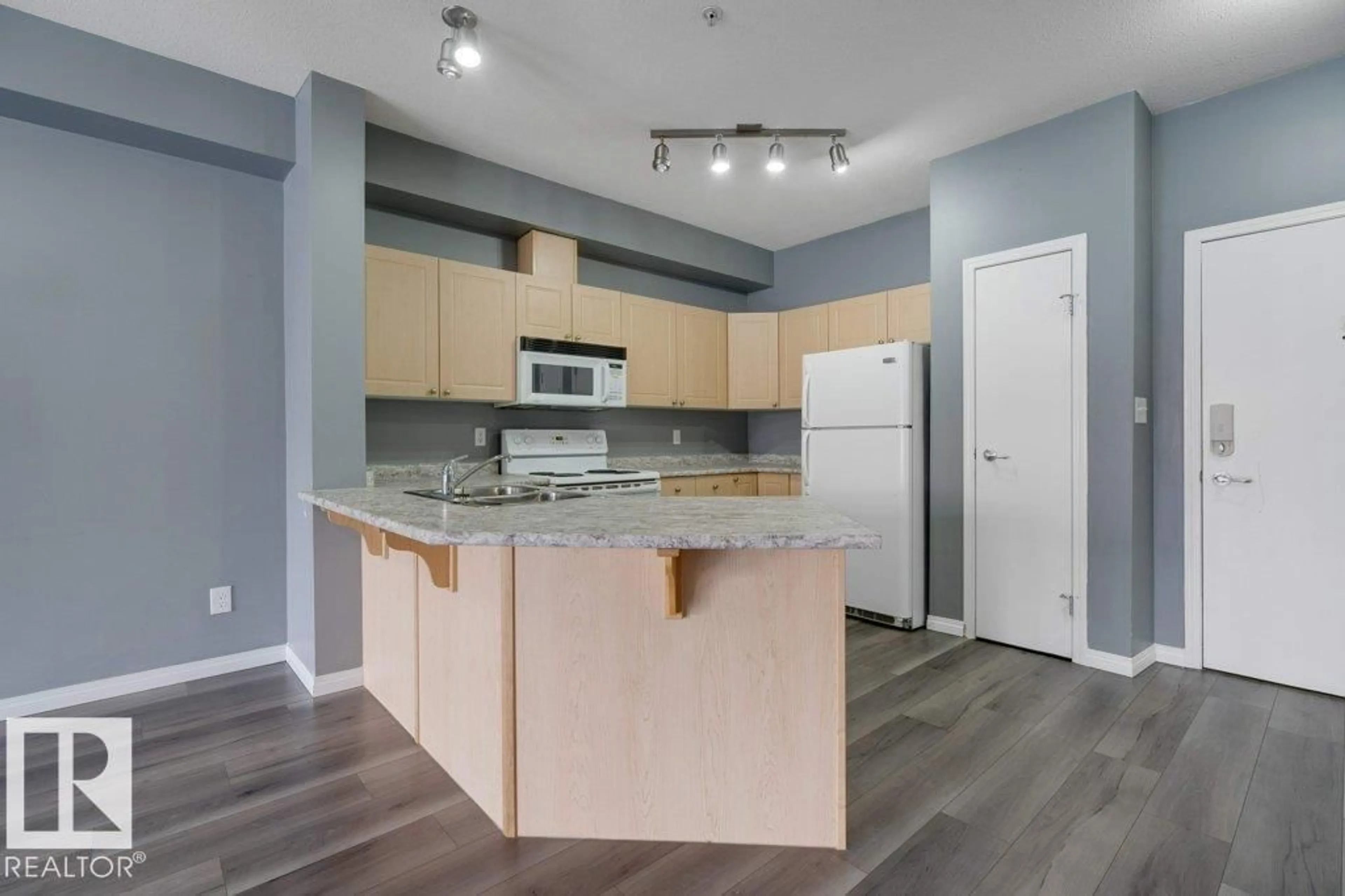 Standard kitchen, unknown for #126 - 4304 139 AV, Edmonton Alberta T5Y0H6