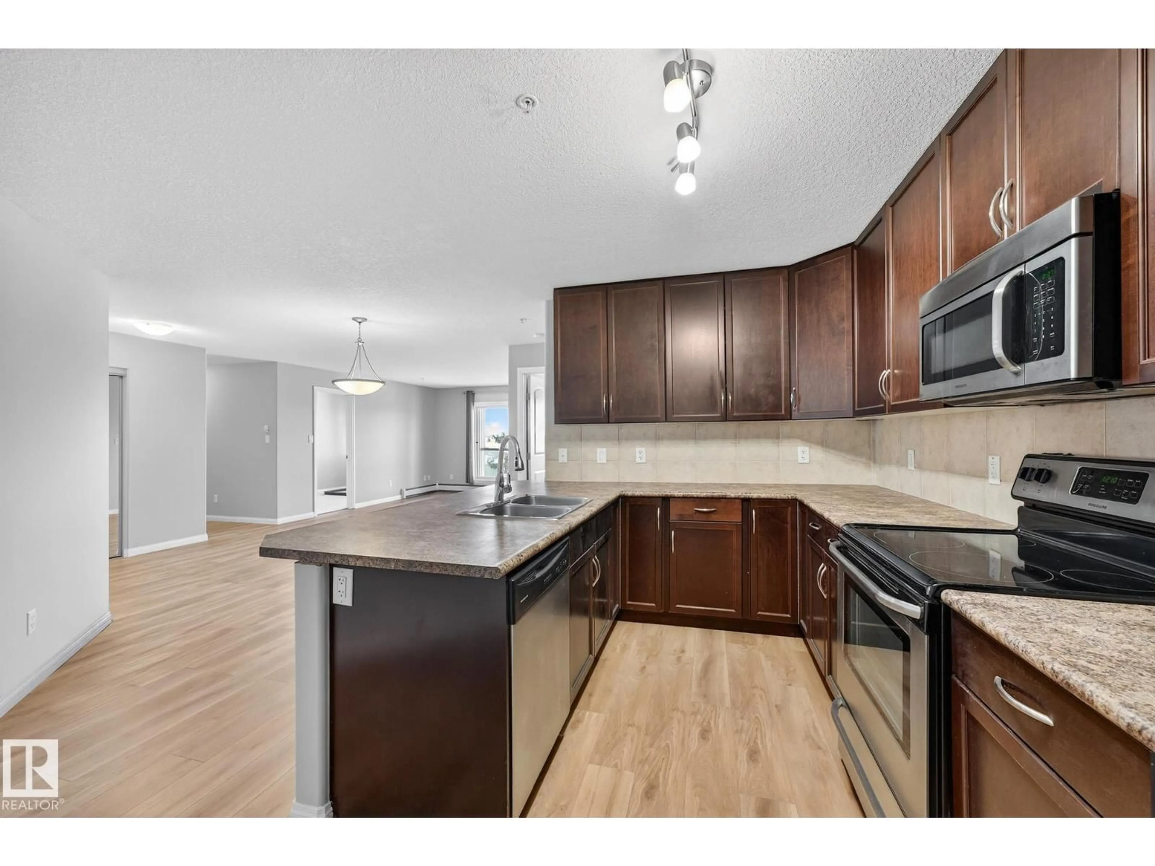 Open concept kitchen, unknown for 319 - 1204 156 ST, Edmonton Alberta T6R0R6