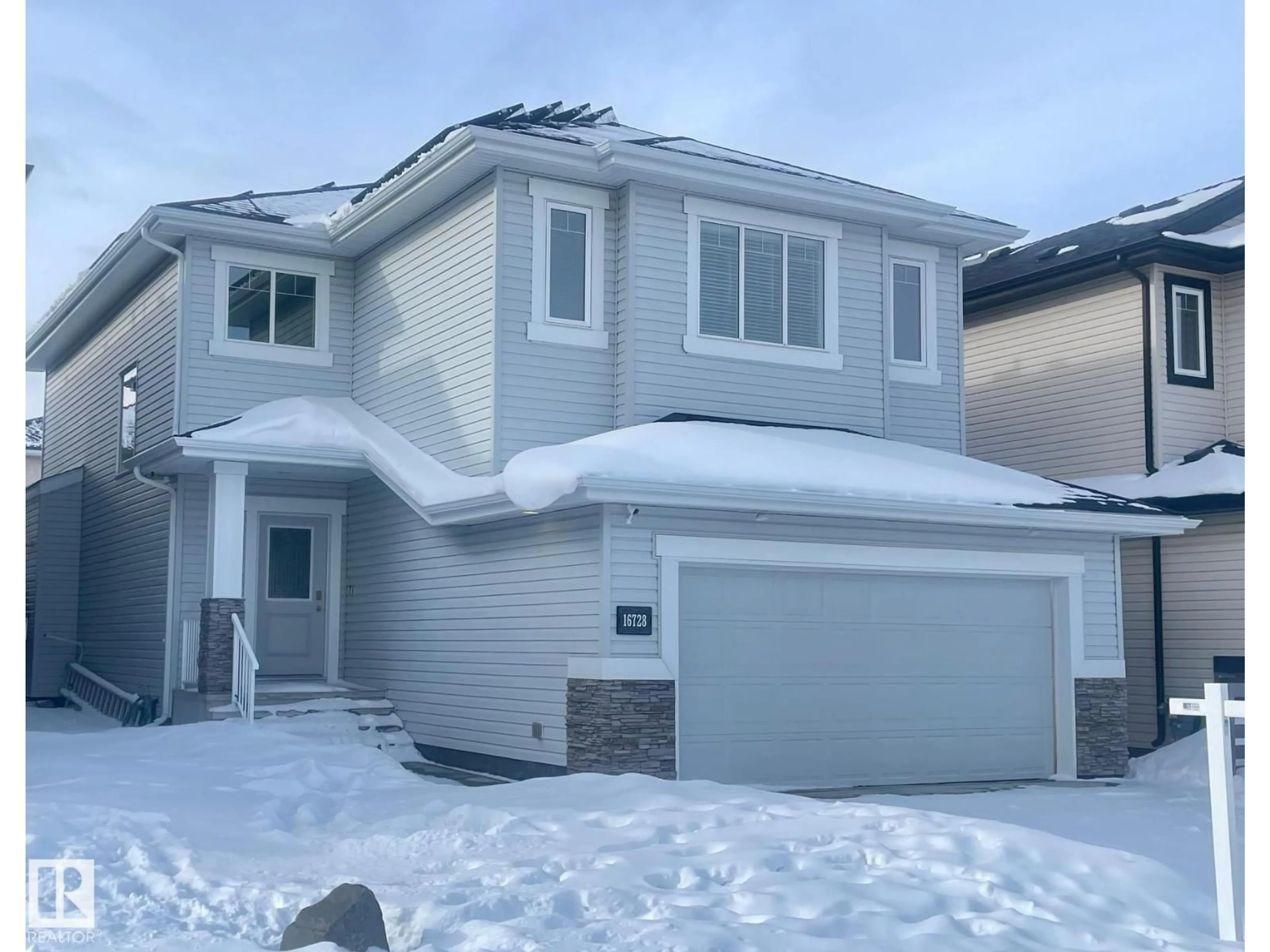 Home with vinyl exterior material, street for NW - 16728 60 ST, Edmonton Alberta T5Y0W6