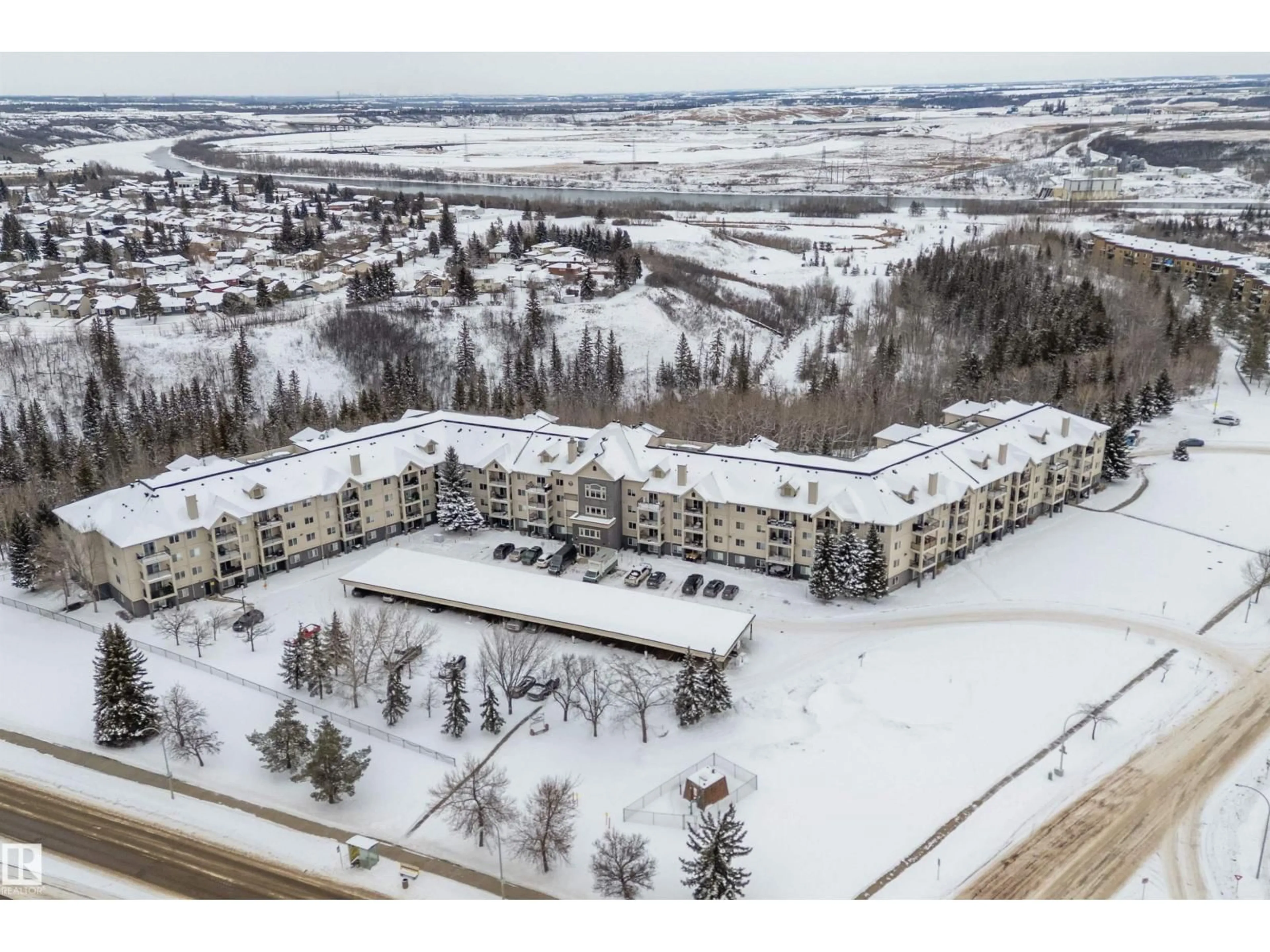 A pic from outside/outdoor area/front of a property/back of a property/a pic from drone, mountain view for 217 - 592 HOOKE RD NW, Edmonton Alberta T5A5H2