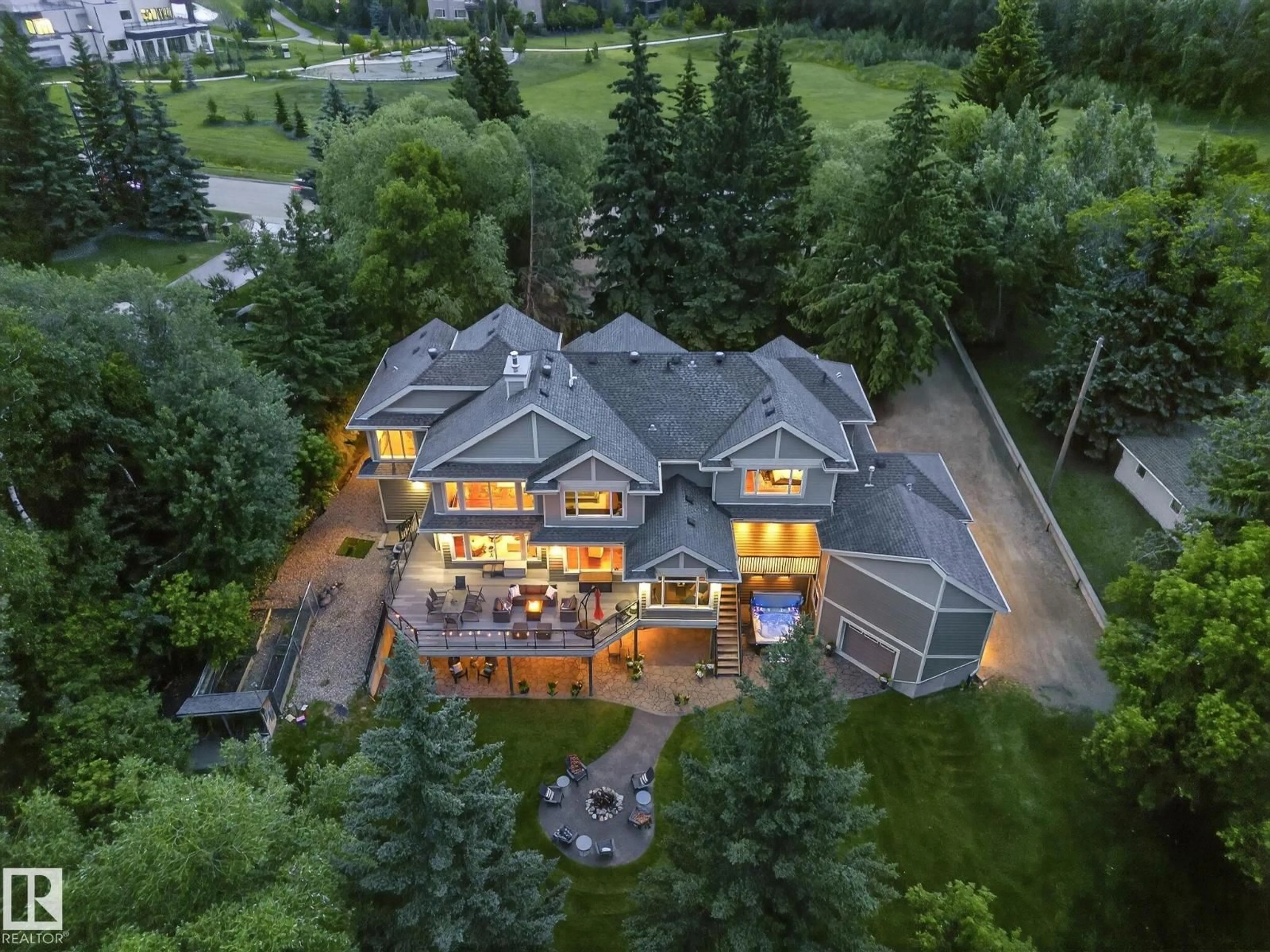 A pic from outside/outdoor area/front of a property/back of a property/a pic from drone, mountain view for 112 WINDERMERE DR, Edmonton Alberta T6W0S4